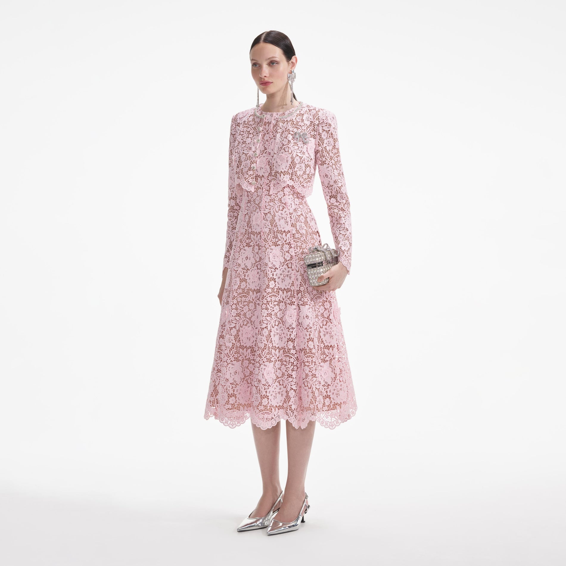 Side view of a woman wearing the Pink Flower Lace Jacket