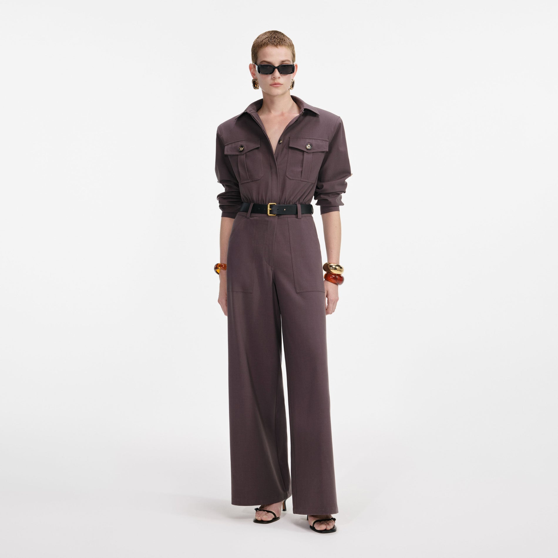 Front view of a woman wearing the Brown Twill Jumpsuit