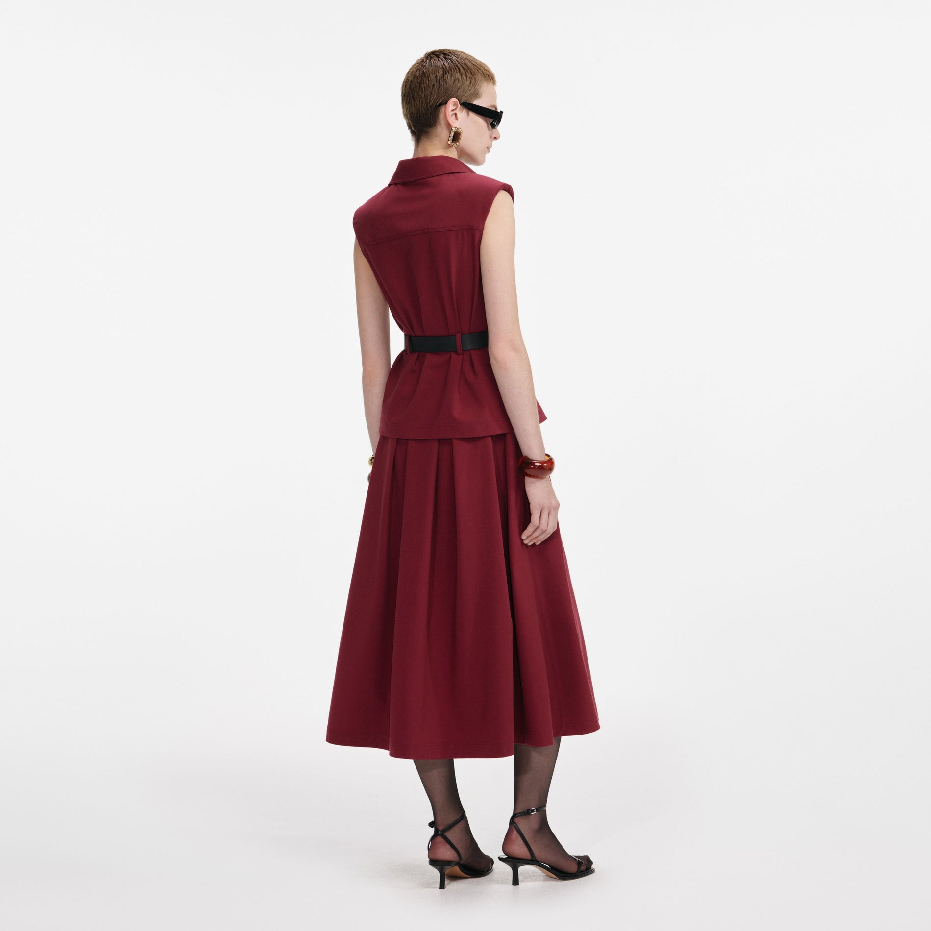 Back view of a woman wearing the Burgundy Twill Belted Midi Dress