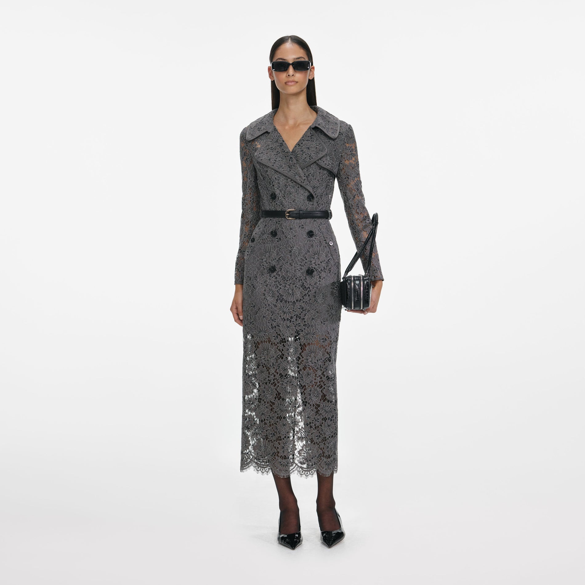 Front view of a woman wearing the Grey Floral Lace Midi Dress