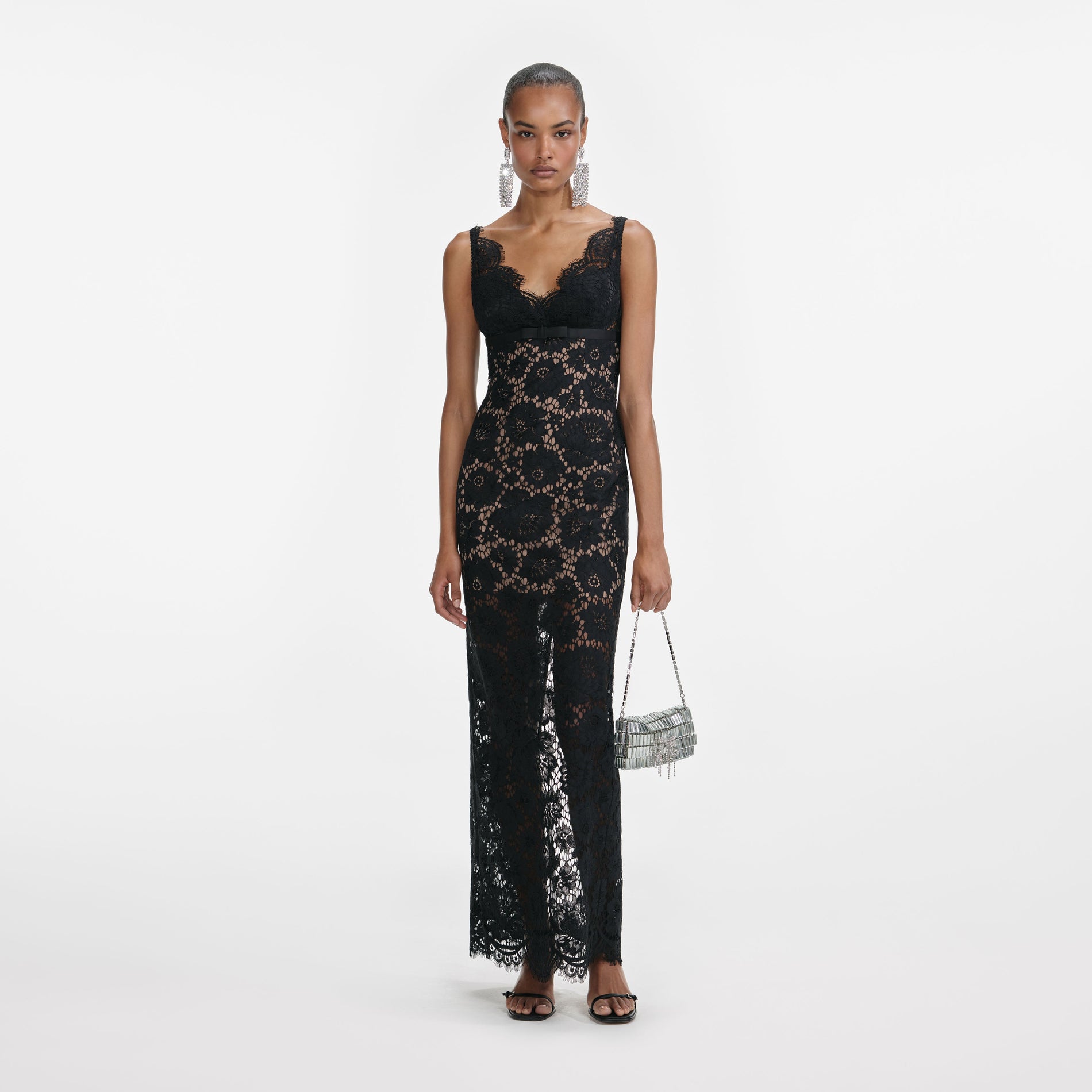Front view of a woman wearing the Black Floral Lace Maxi Dress