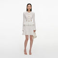 White Pointelle Peplum Knit Mini Dress