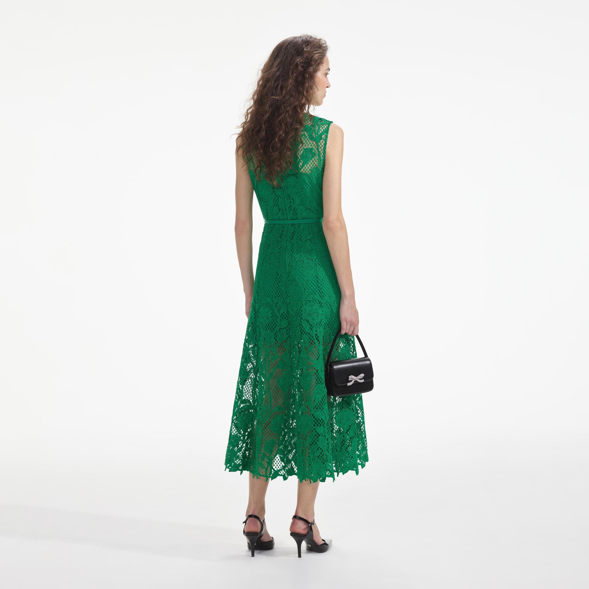 Back view of a woman wearing the Green Lace Sleeveless Midi Dress