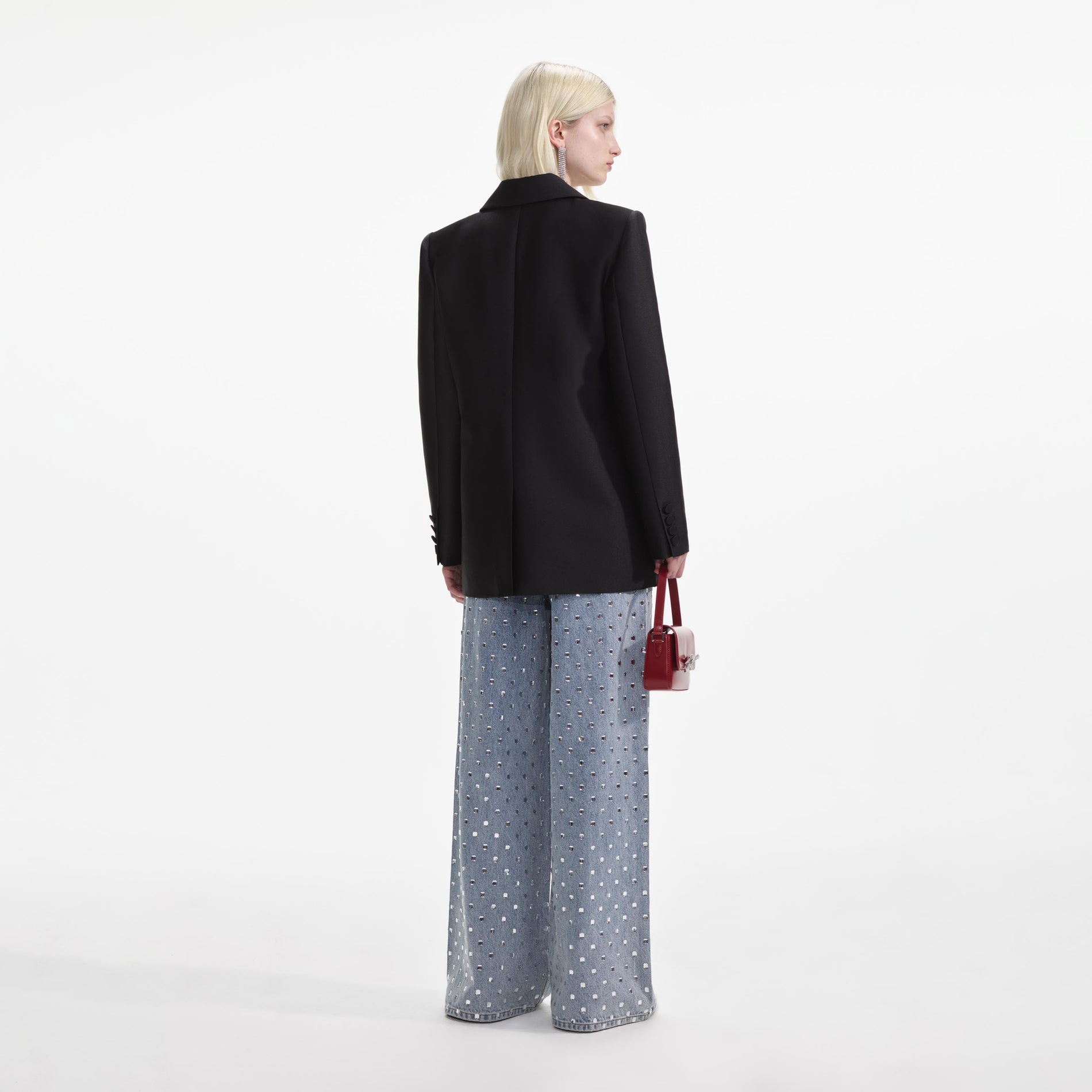 Back view of a woman wearing the Black Taffeta Blazer
