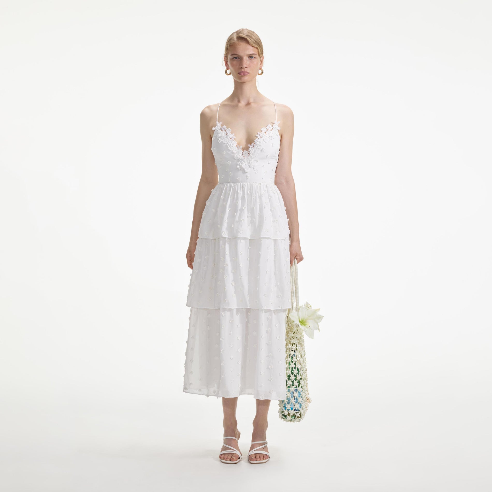 Front view of a woman wearing the White Tie Back Midi Dress