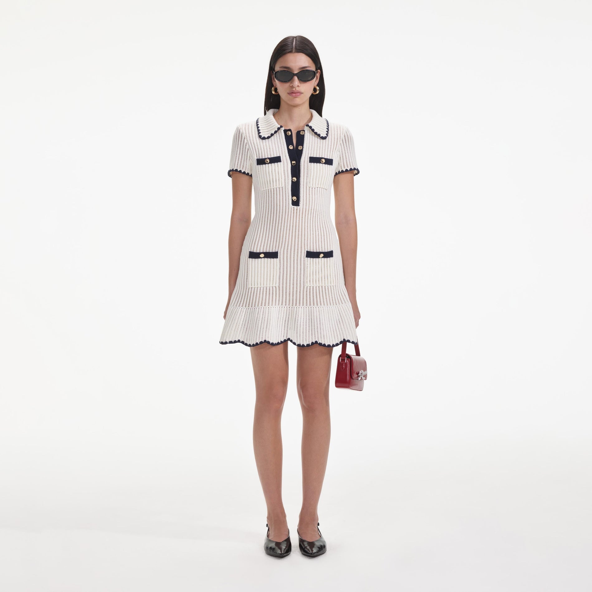 Front view of a woman wearing the Cream Crochet Collared Mini Dress