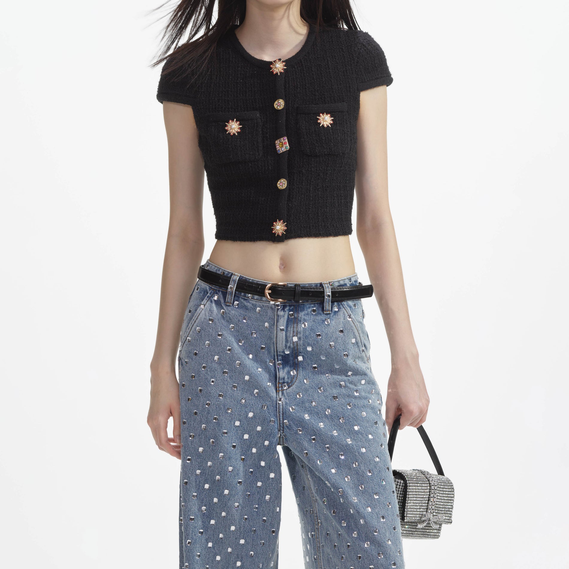 A close up of a woman wearing the Square Rhinestone Denim Jeans