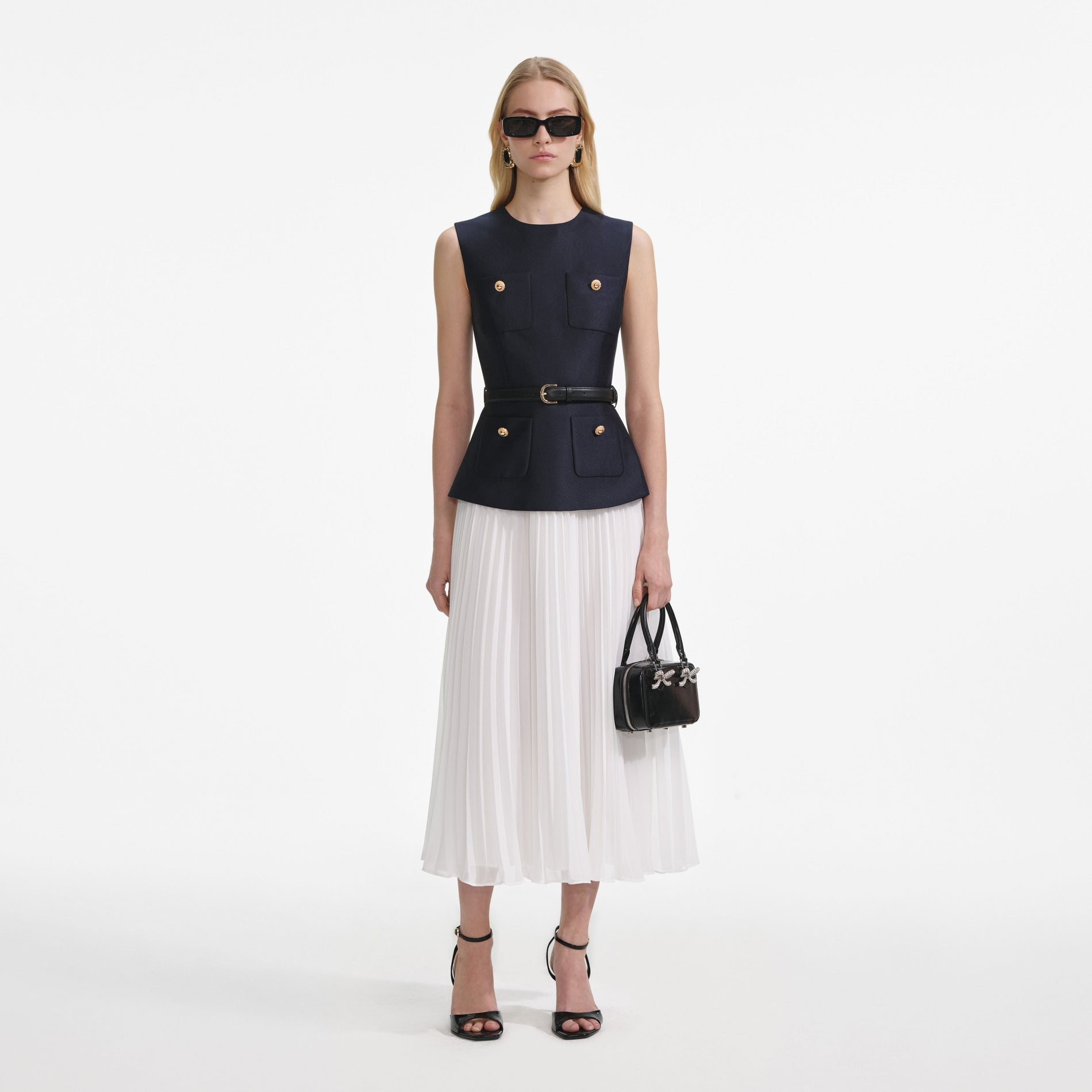 Front view of a woman wearing the Navy Taffeta Midi Dress