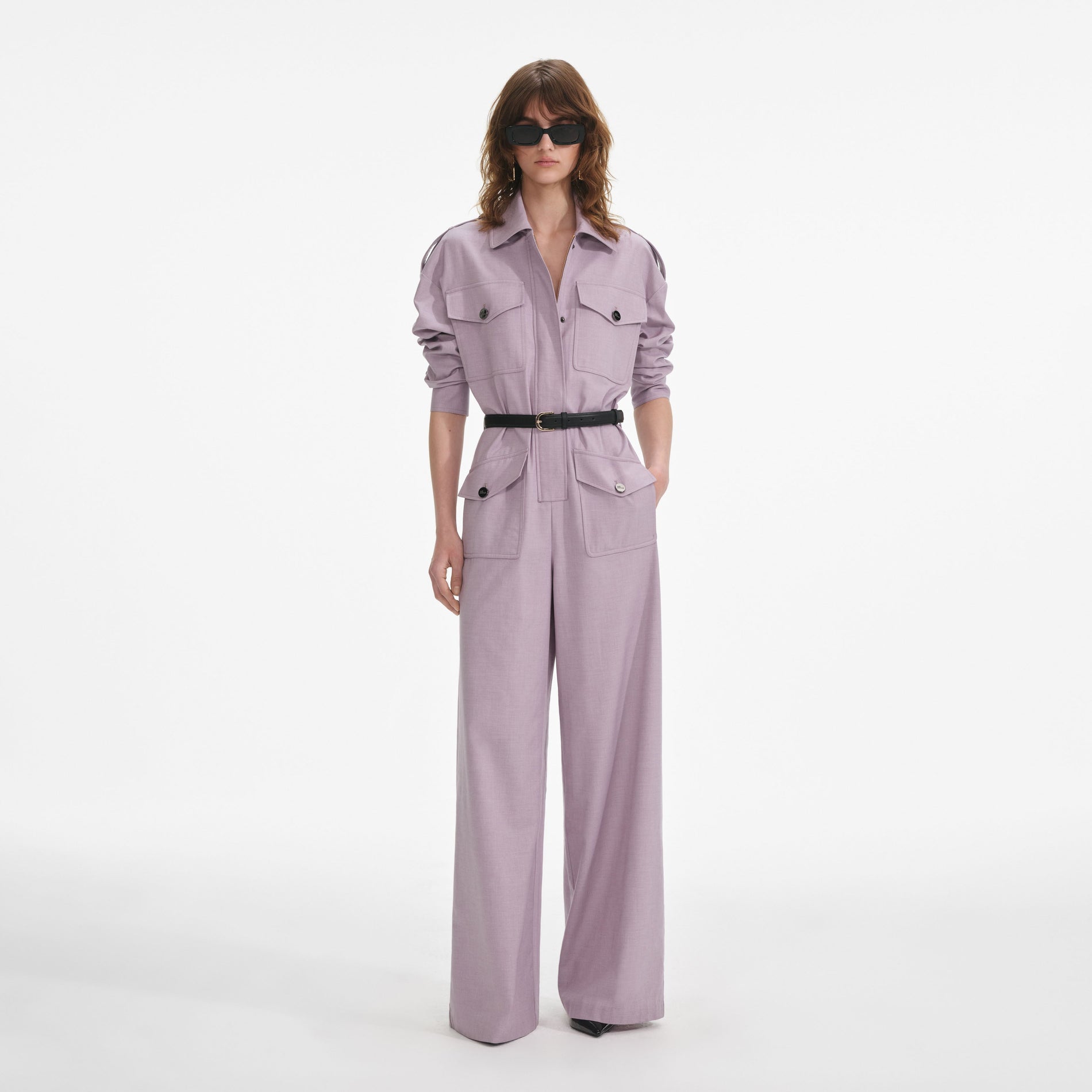 Front view of a woman wearing the Lilac Twill Jumpsuit