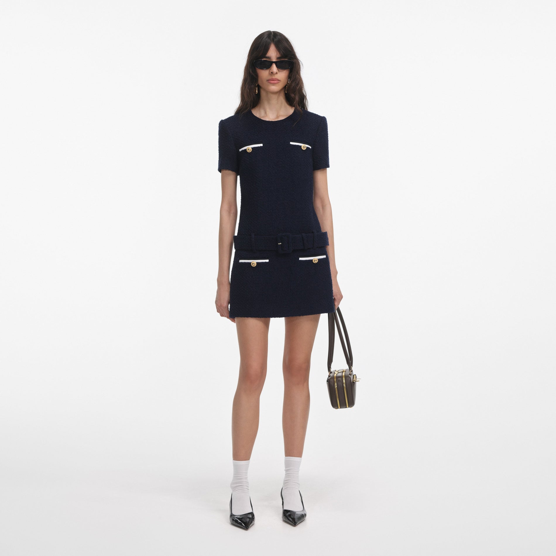 Front view of a woman wearing the Navy Boucle Mini Dress
