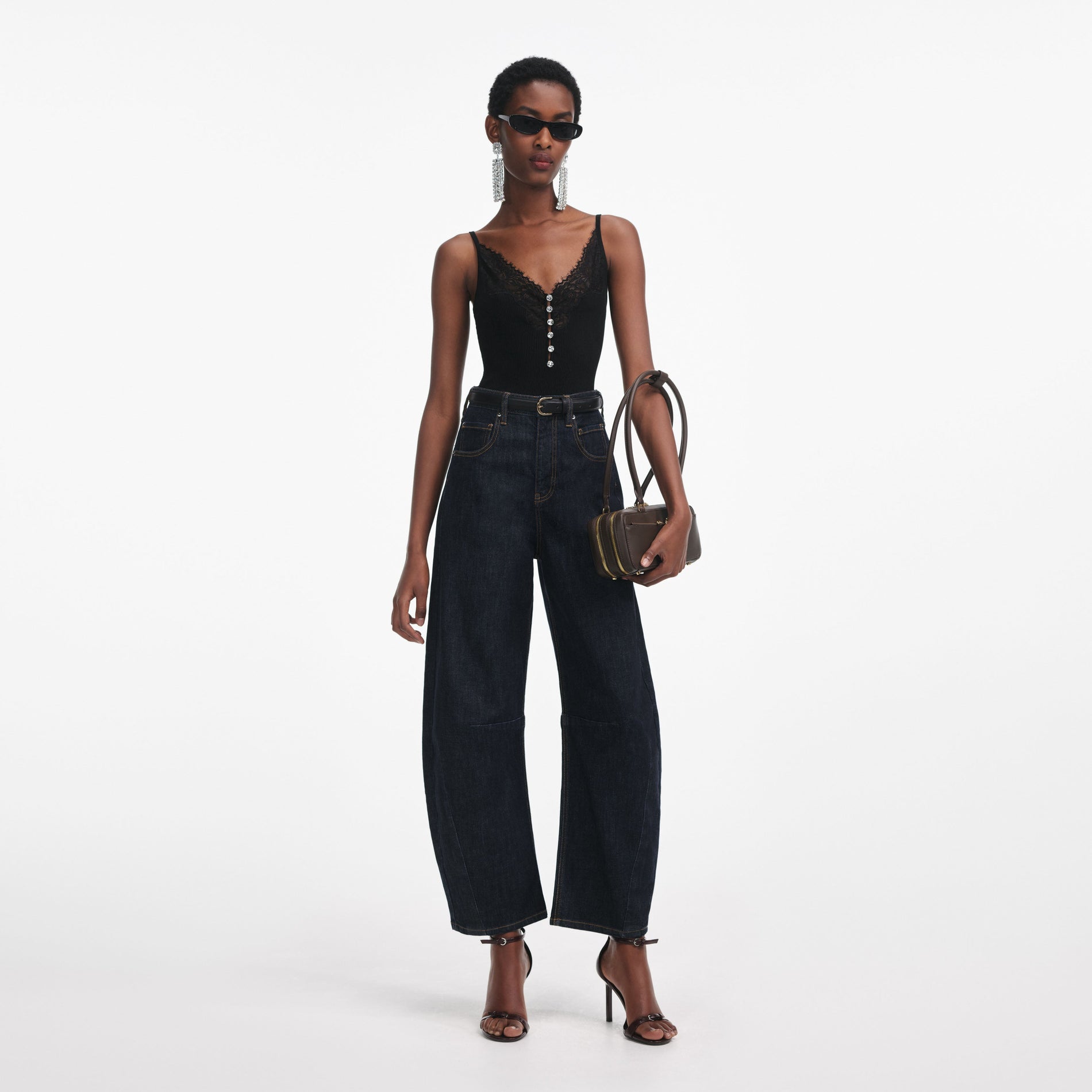 Front view of a woman wearing the Black Lace Trim Rib Knit Top