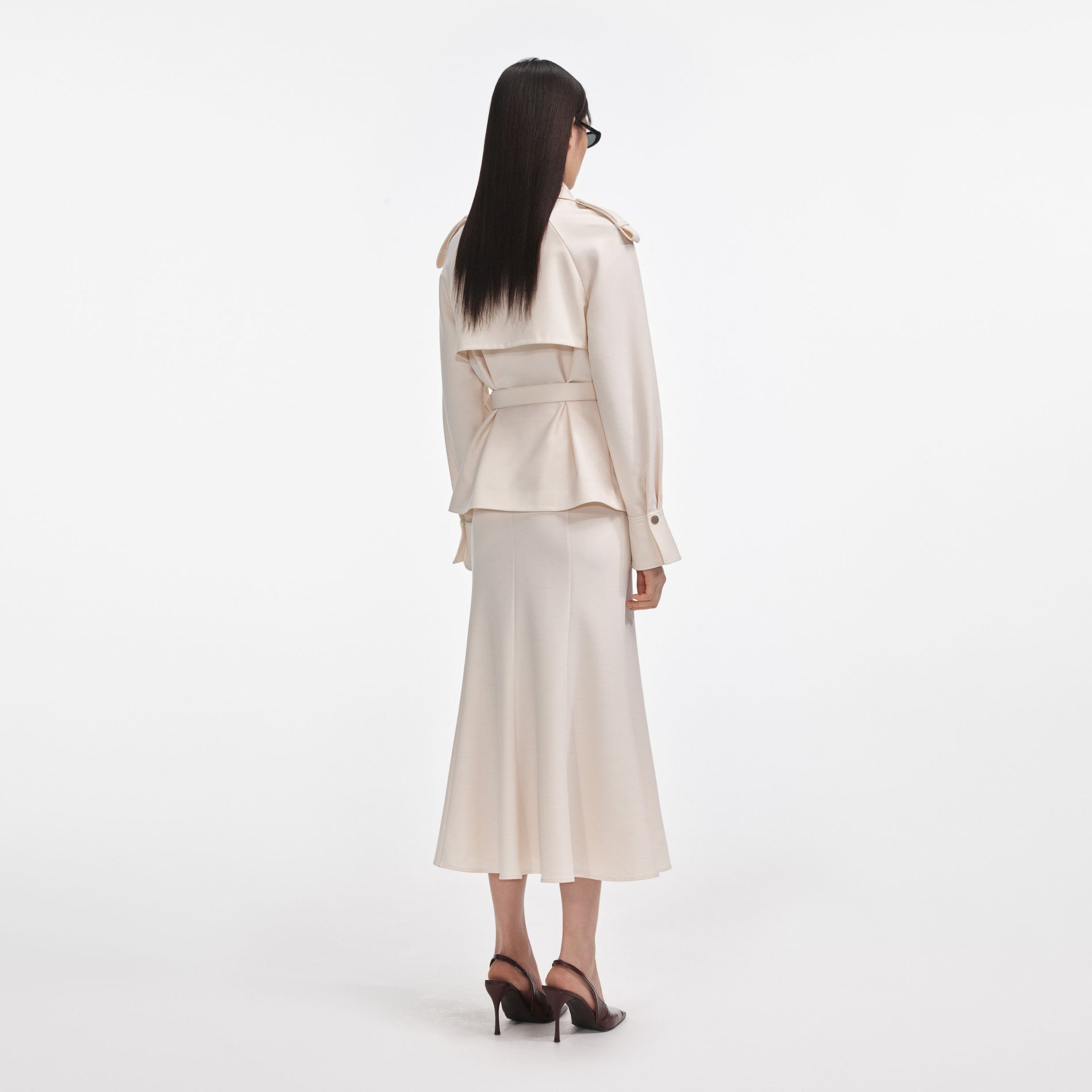 Back view of a woman wearing the Cream Twill Midi Dress