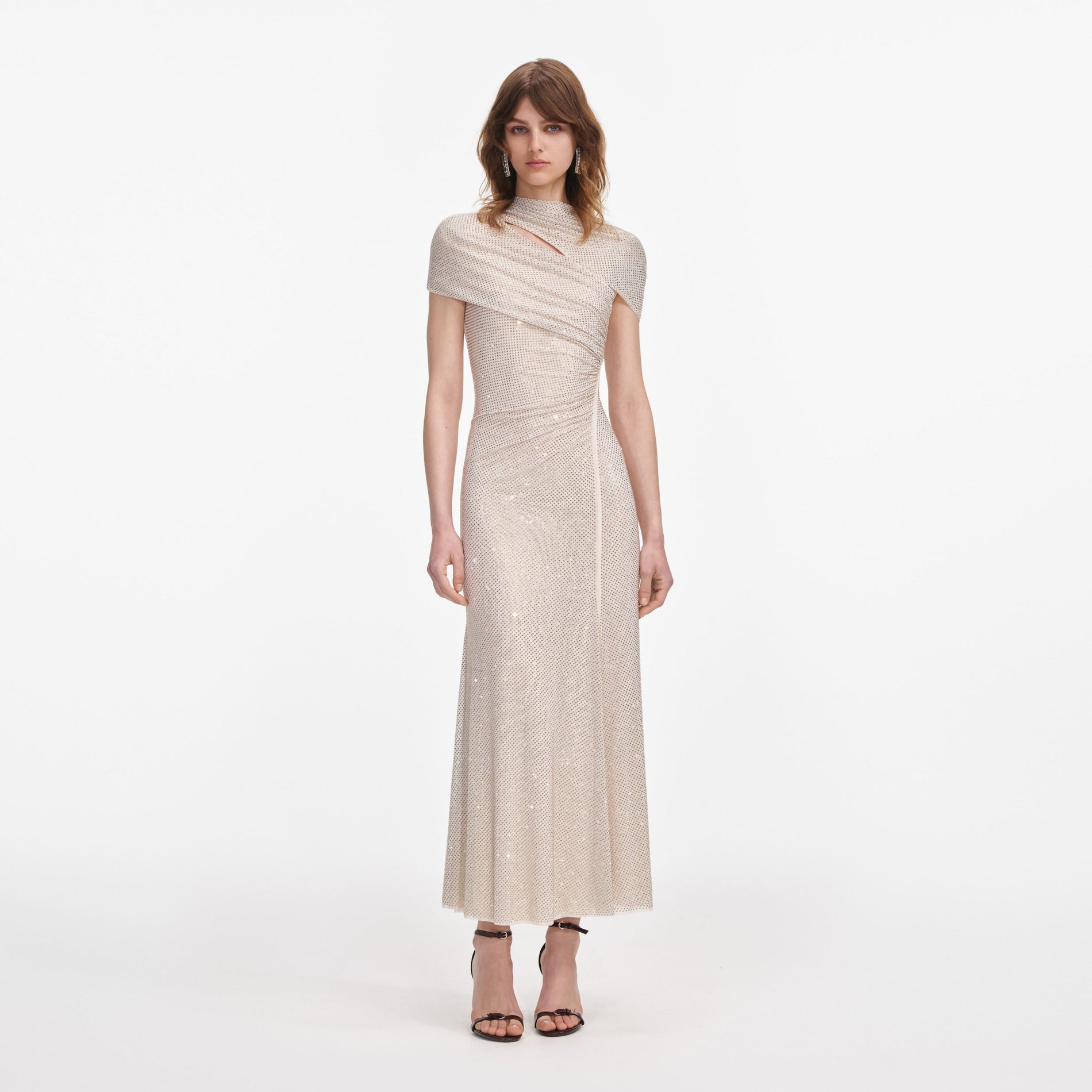 Front view of a woman wearing the Champagne Rhinestone Mesh Cut Out Midi Dress