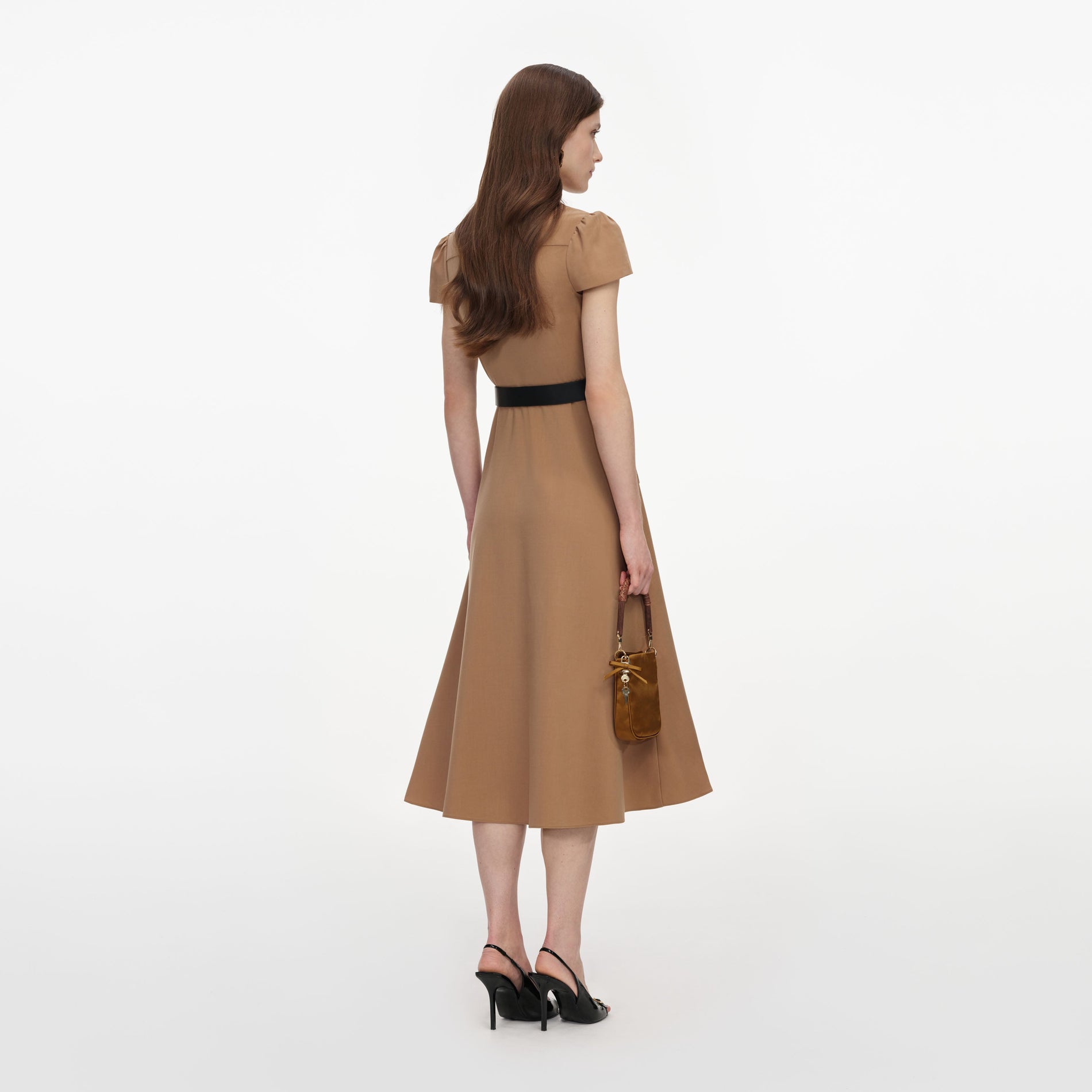 Back view of a woman wearing the Tan Twill Belted Midi Dress