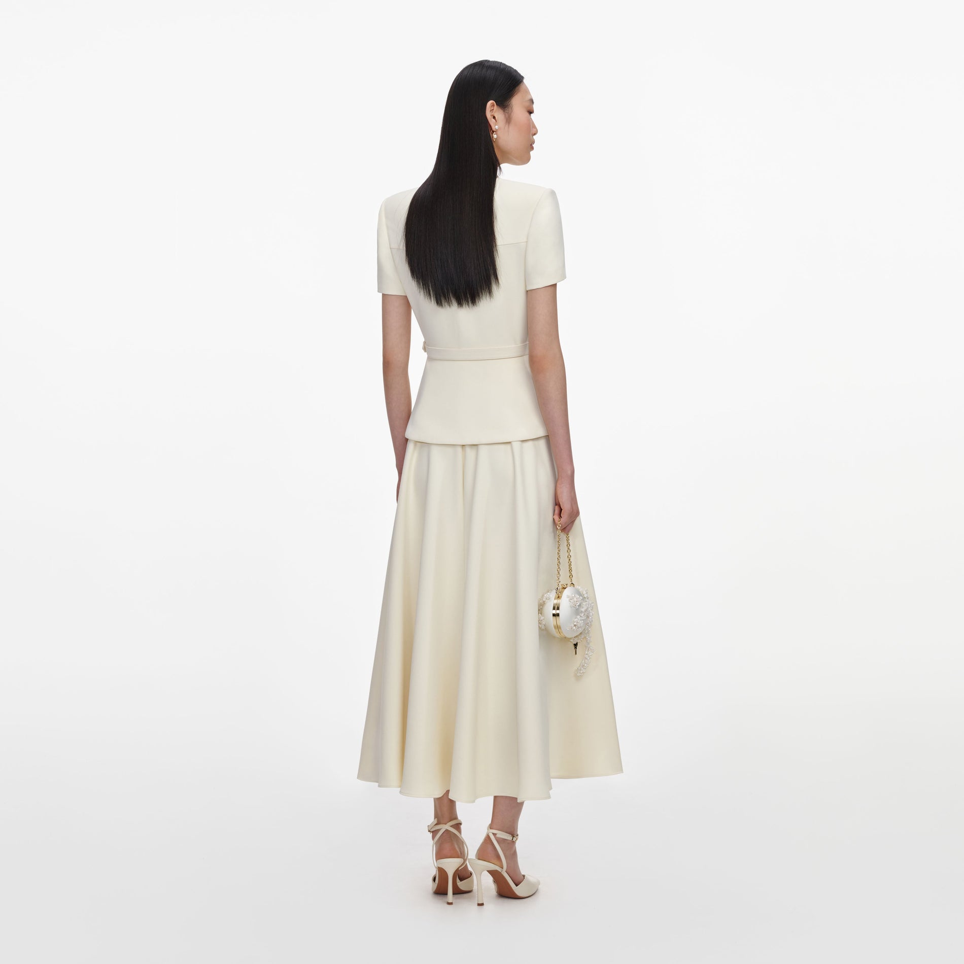 Back view of a woman wearing the Yellow Crepe Tailored Midi Dress