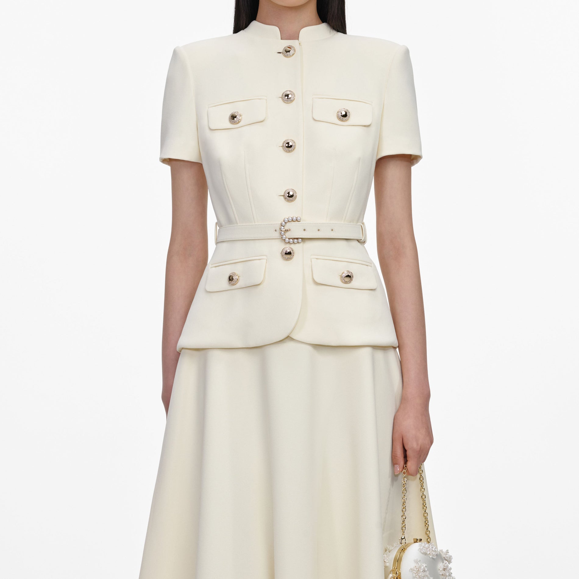 A close up of a woman wearing the Yellow Crepe Tailored Midi Dress