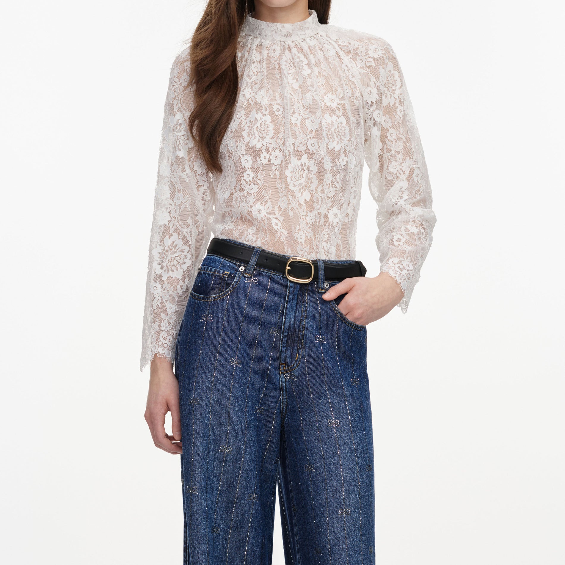 A close up of a woman wearing the Rhinestone Stripe Denim Jeans