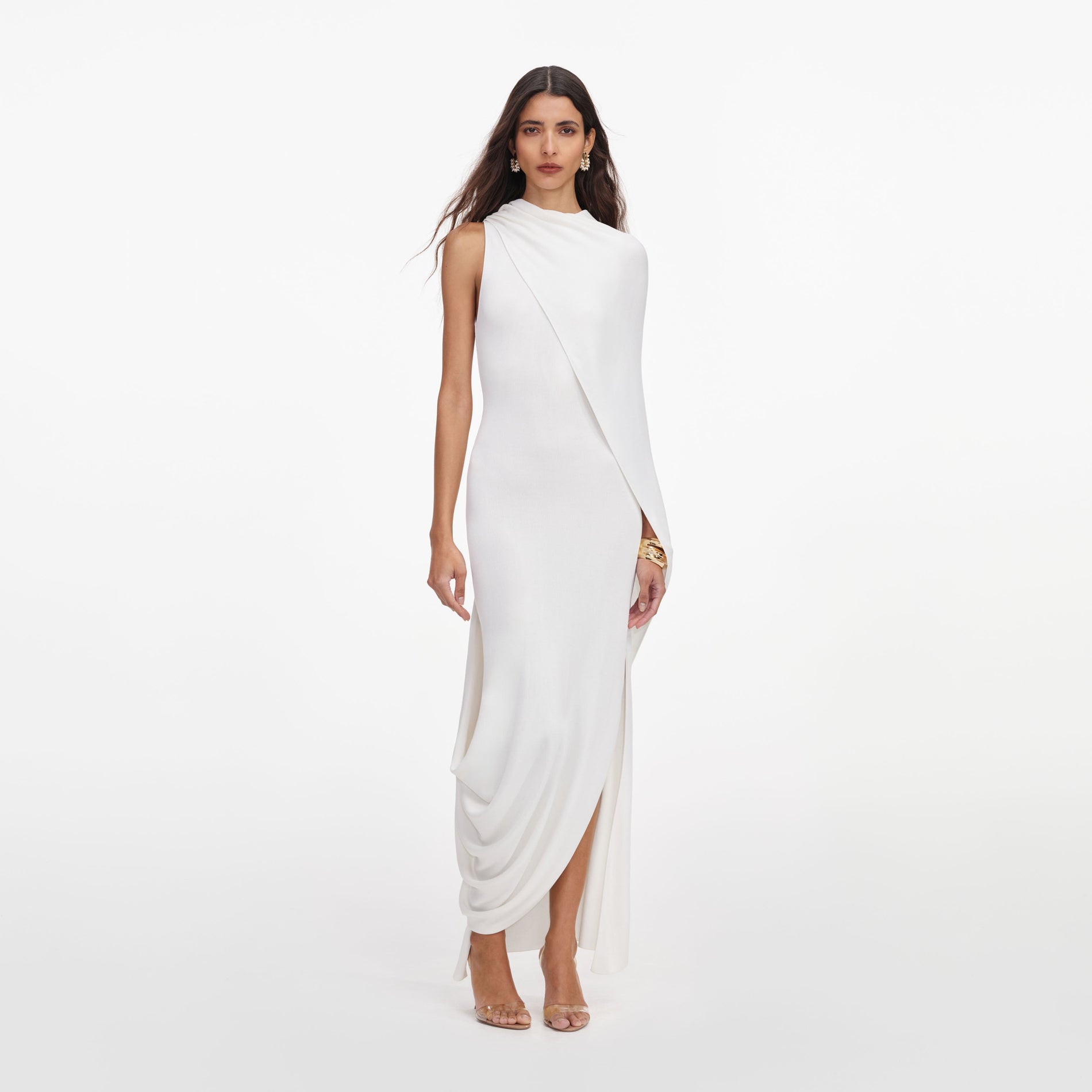 Front view of a woman wearing the White Viscose Knit Drape Maxi Dress