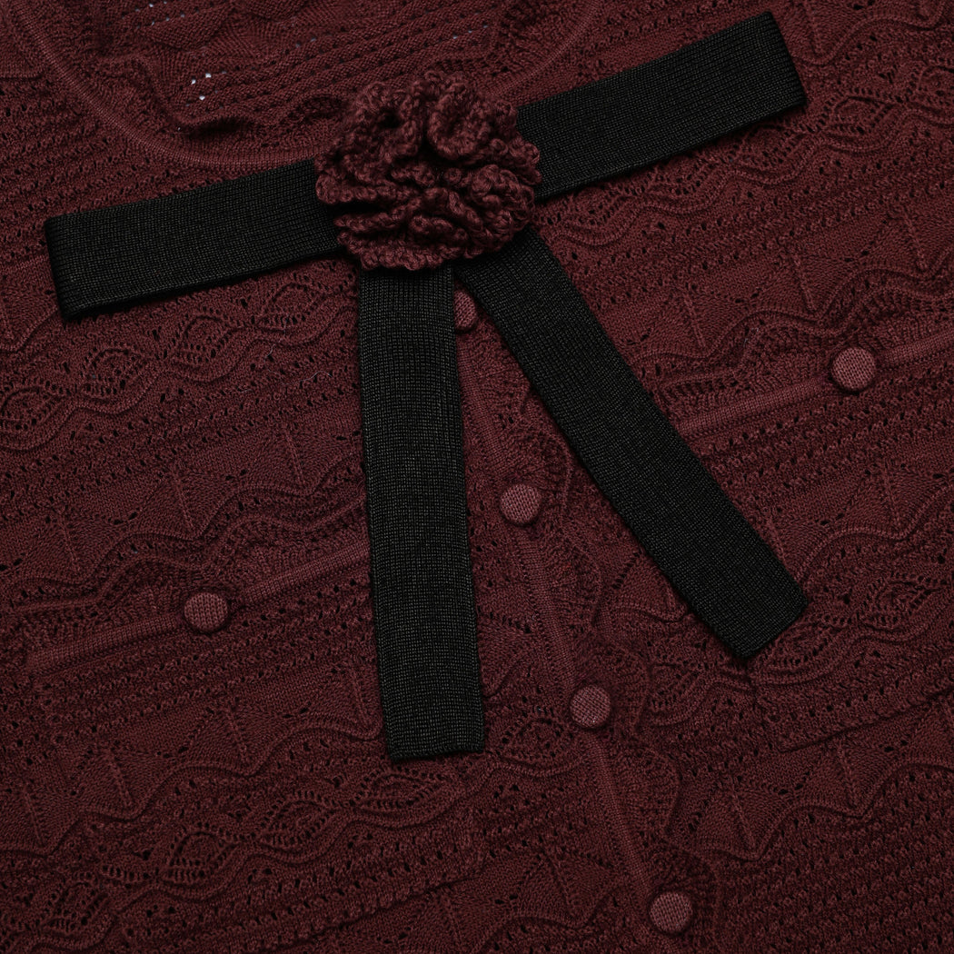A close up of the fabric for the Brown Pointelle Knit Top