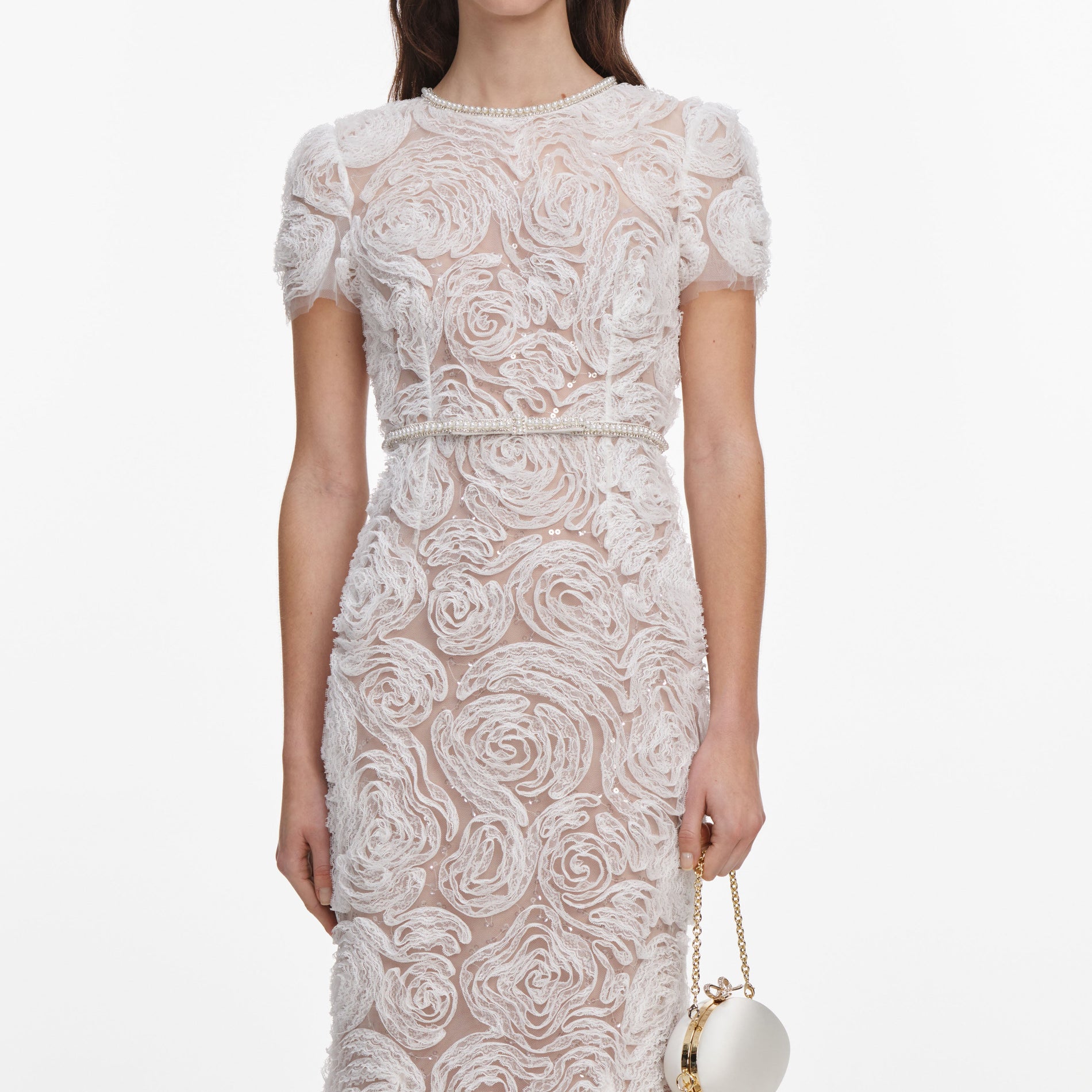 A close up of a woman wearing the White Tulle Lace Maxi Dress