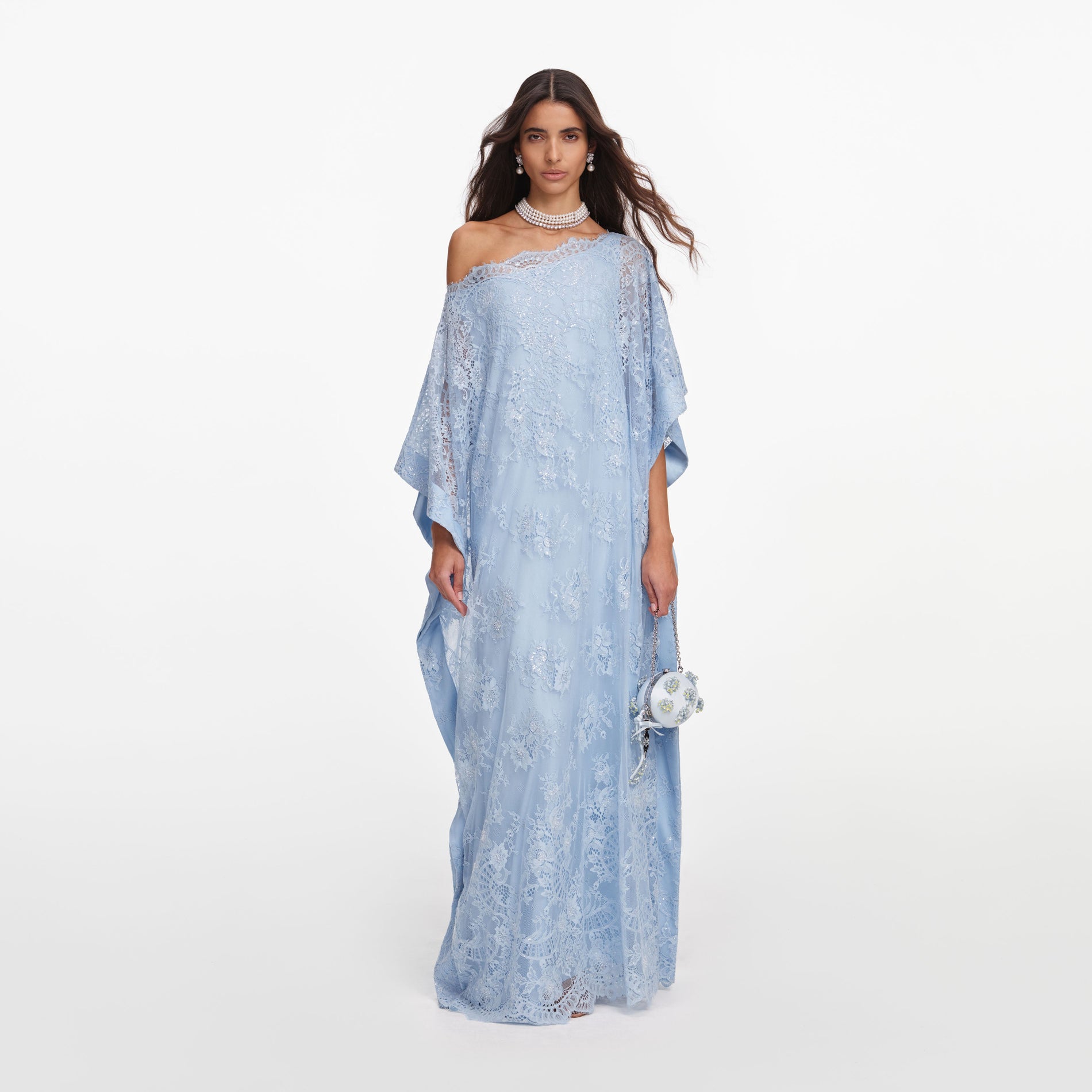 Front view of a woman wearing the Blue Embellished Lace Kaftan