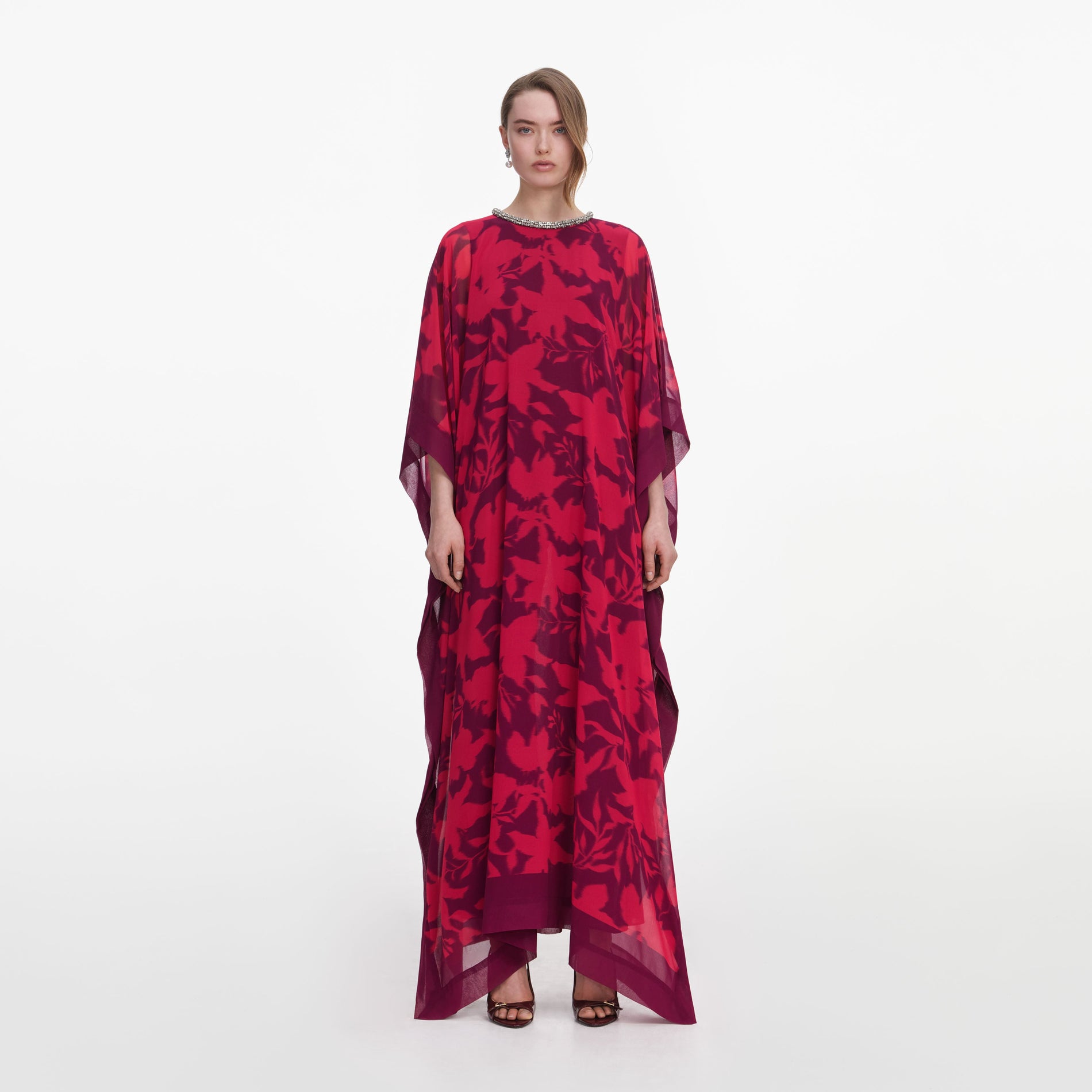 Front view of a woman wearing the Pink Floral Kaftan