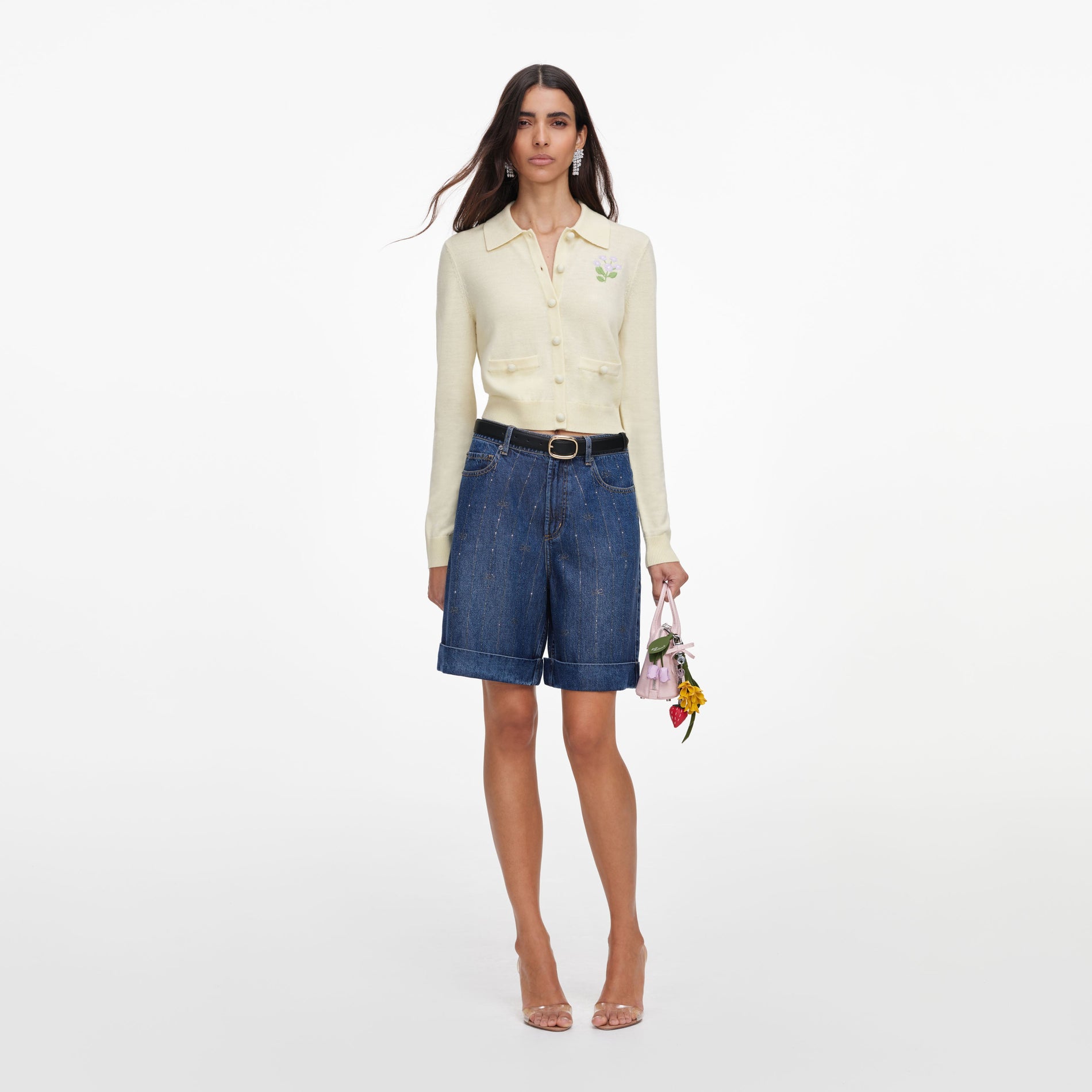 Front view of a woman wearing the Yellow Flower Embroidered Knit Cardigan