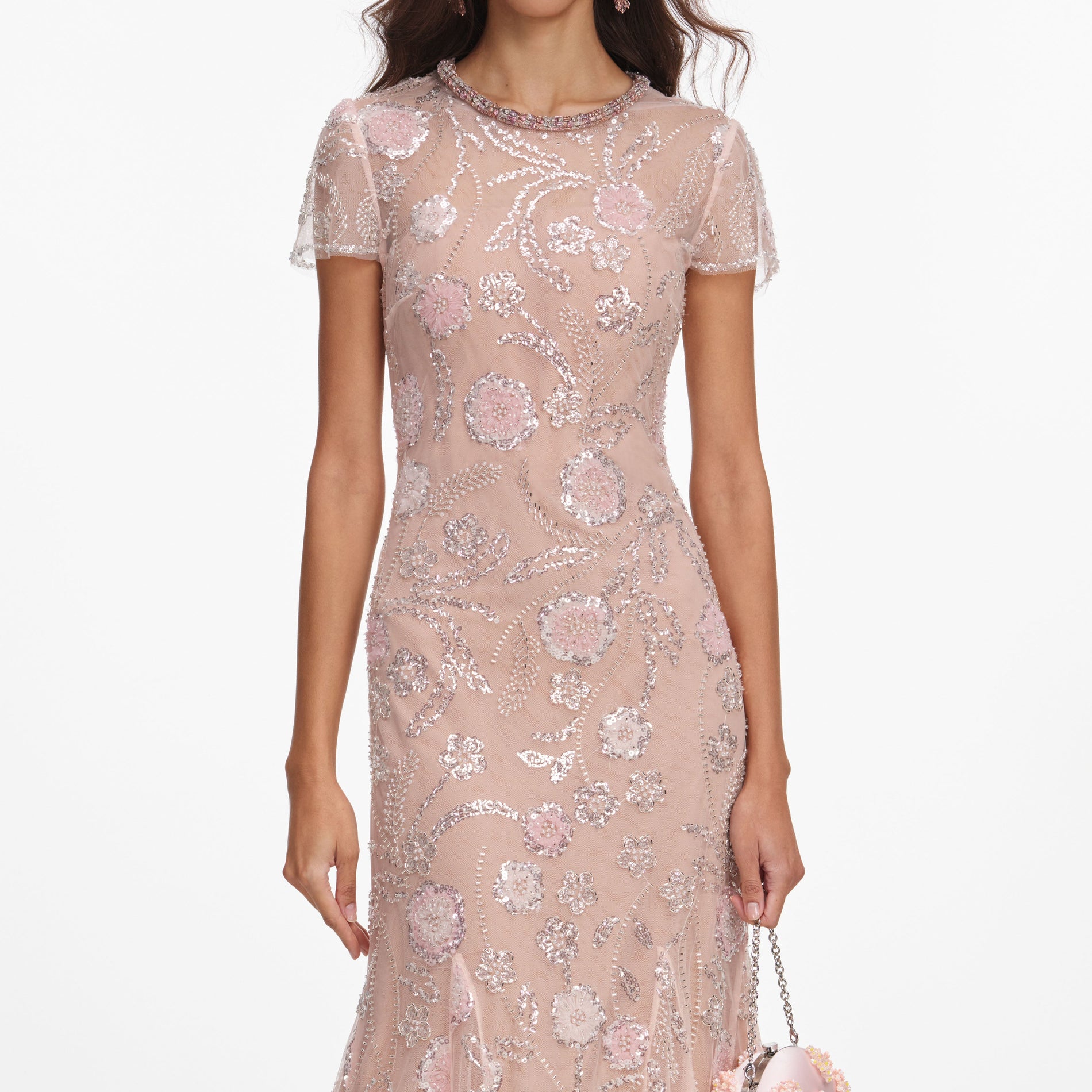 A close up of a woman wearing the Pink Flower Sequin Embellished Midi Dress