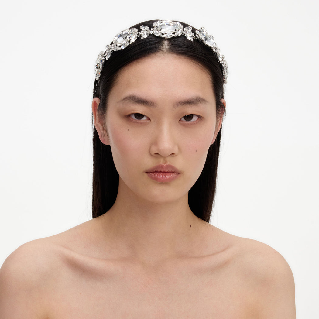 A close up of a woman wearing the Multi Crystal Headband
