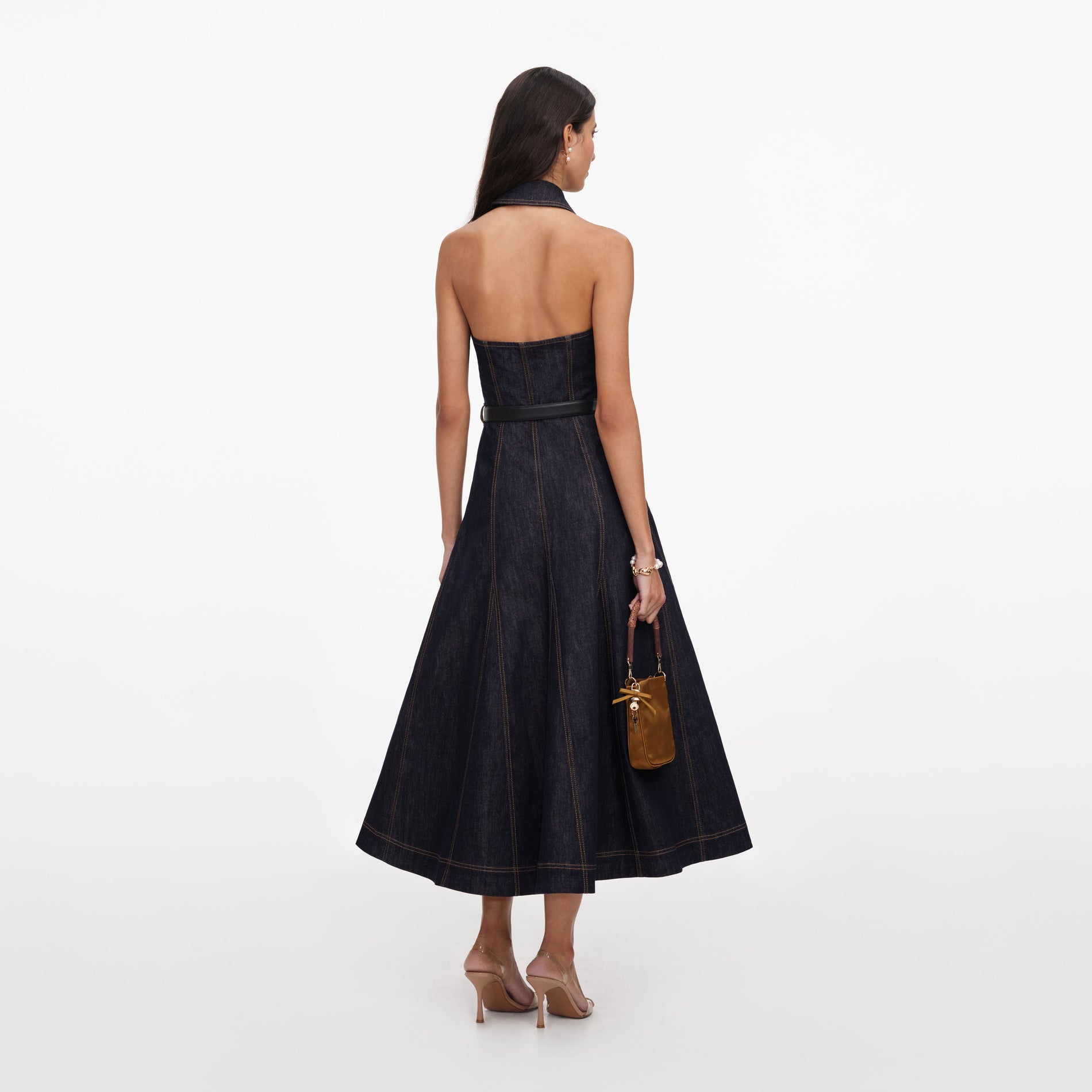 Back view of a woman wearing the Indigo Denim Halterneck Midi Dress