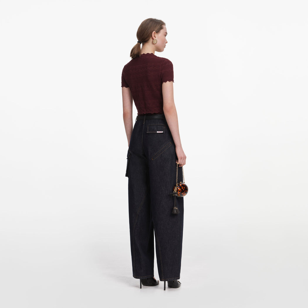 Back view of a woman wearing the Indigo Denim Cargo Jeans