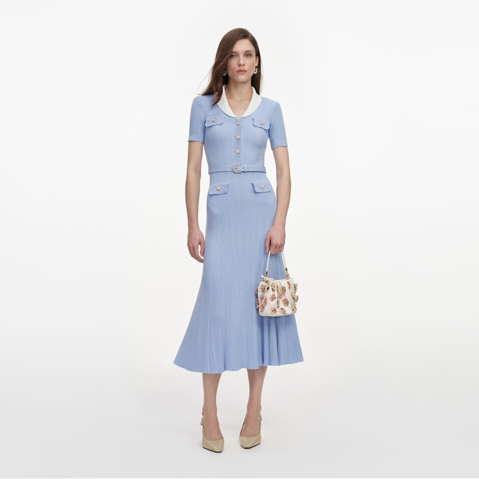 Front view of a woman wearing the Blue Ribbed Knit Midi Dress