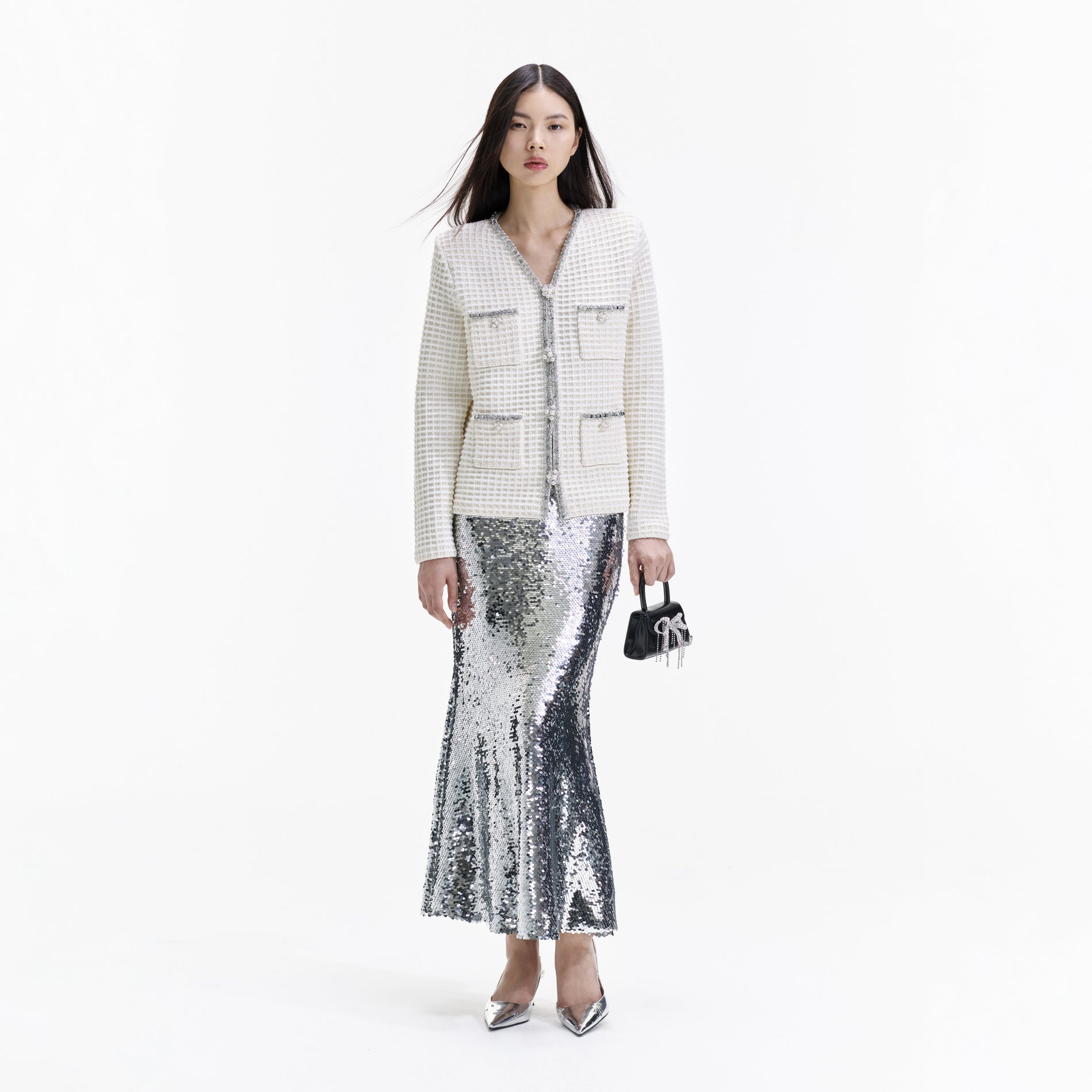 Front view of a woman wearing the Cream Knit Cardigan