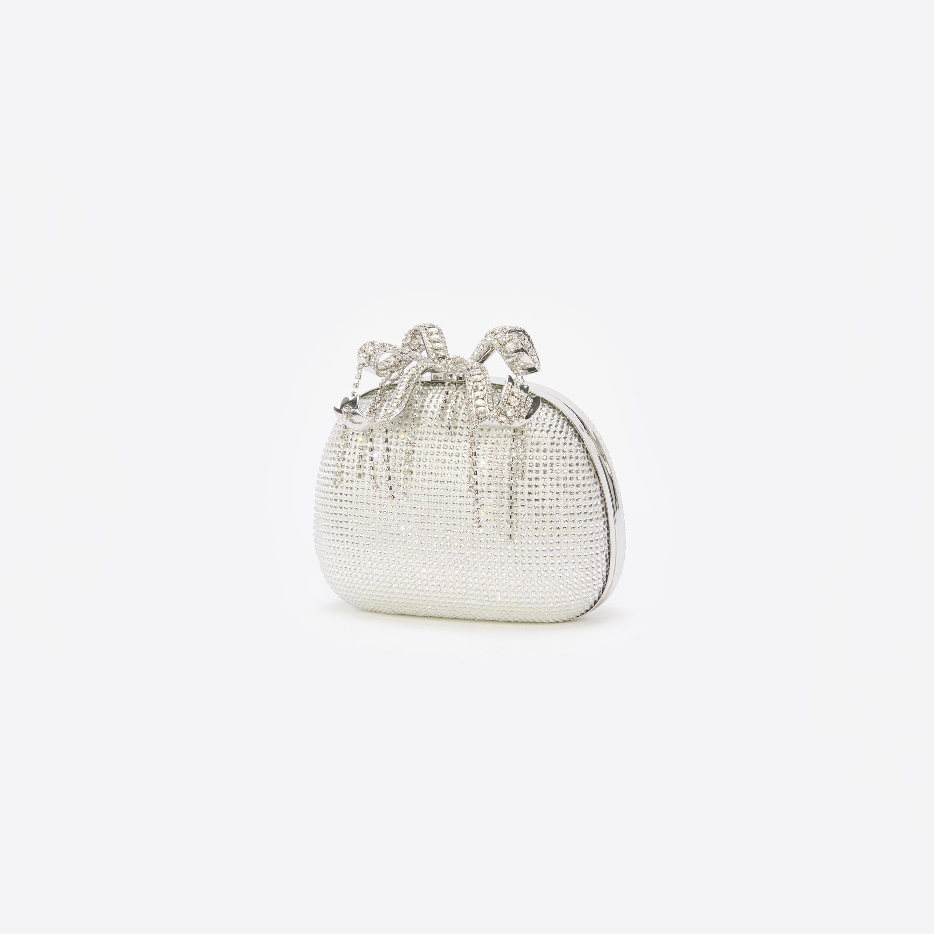 Side view of a woman wearing the Champagne Rhinestone Clutch Bag