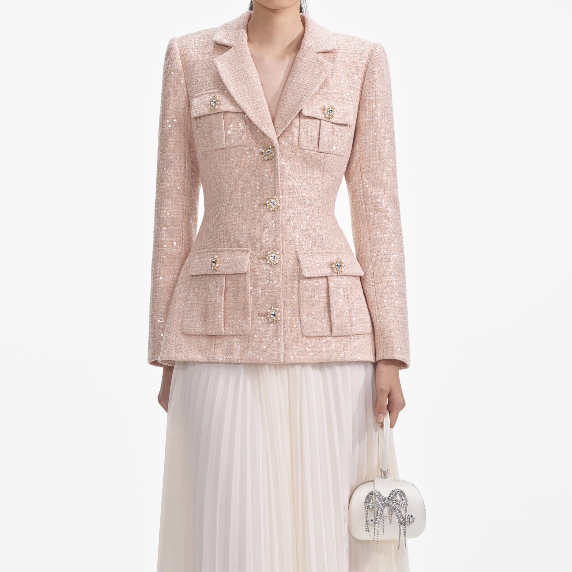 A close up of a woman wearing the Sequin Boucle Chiffon Midi Dress