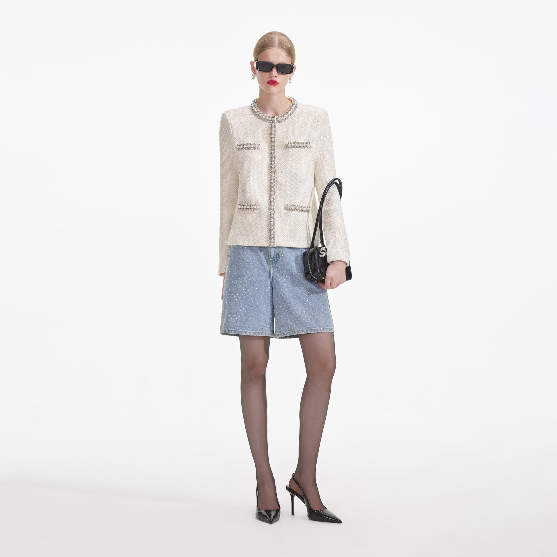 Back view of a woman wearing the Cream Textured Knit Embellished Cardigan