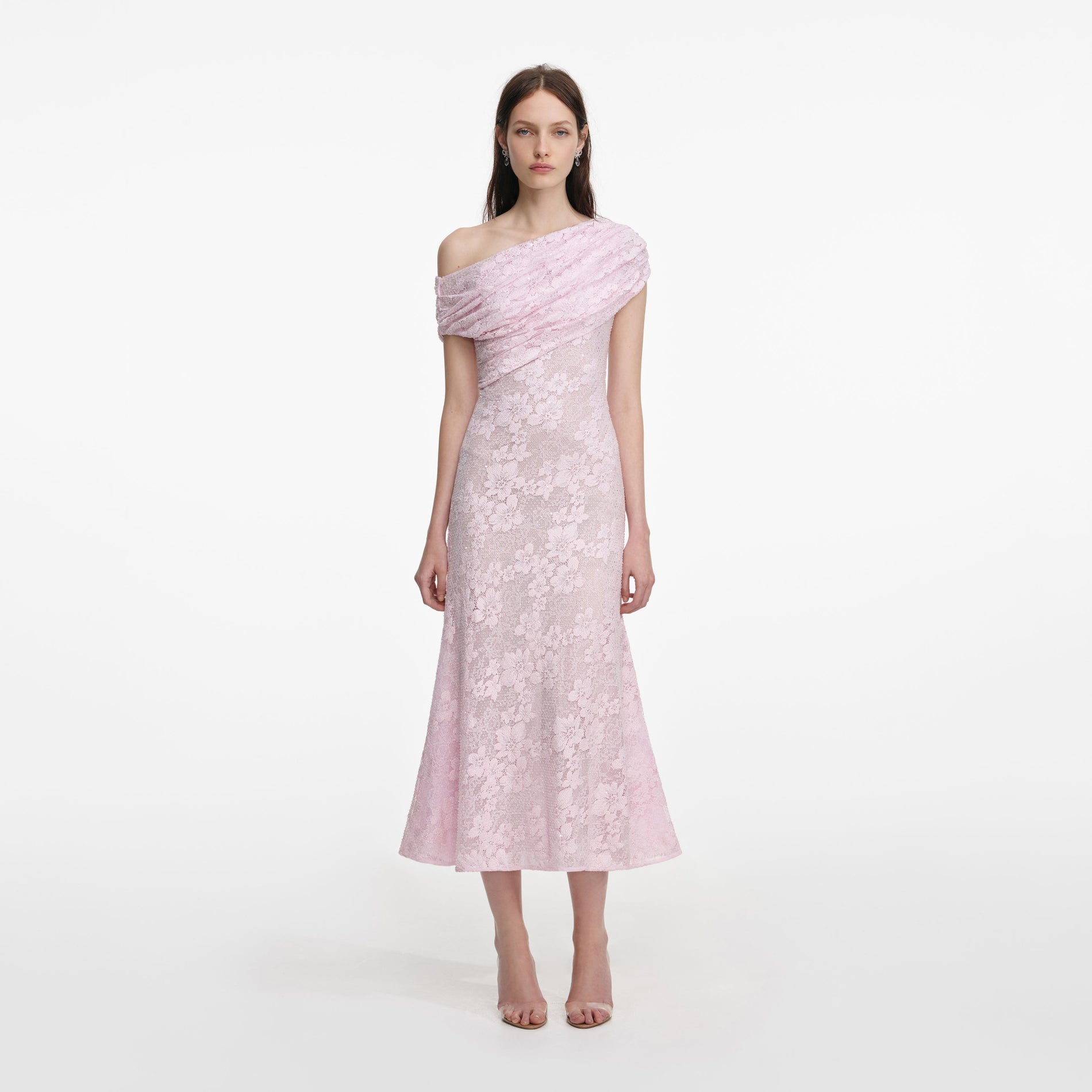 Front view of a woman wearing the Pink Rhinestone Lace Asymmetric Midi Dress