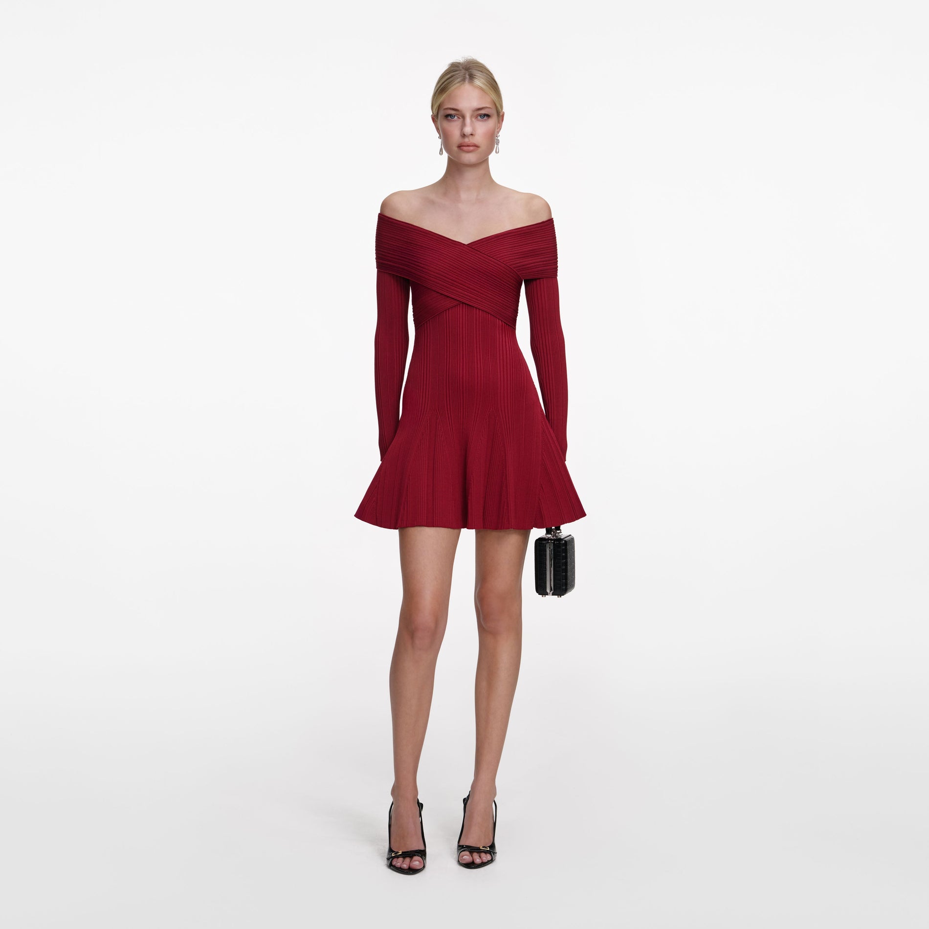 Front view of a woman wearing the Burgundy Viscose Knit Mini Dress