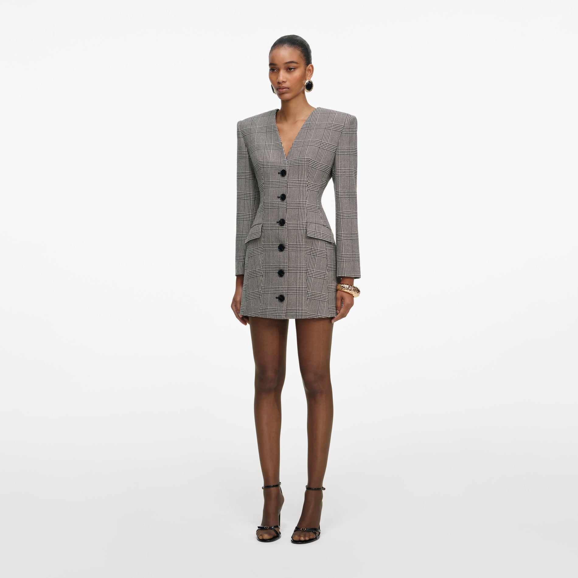 Side view of a woman wearing the Check Blazer Mini Dress