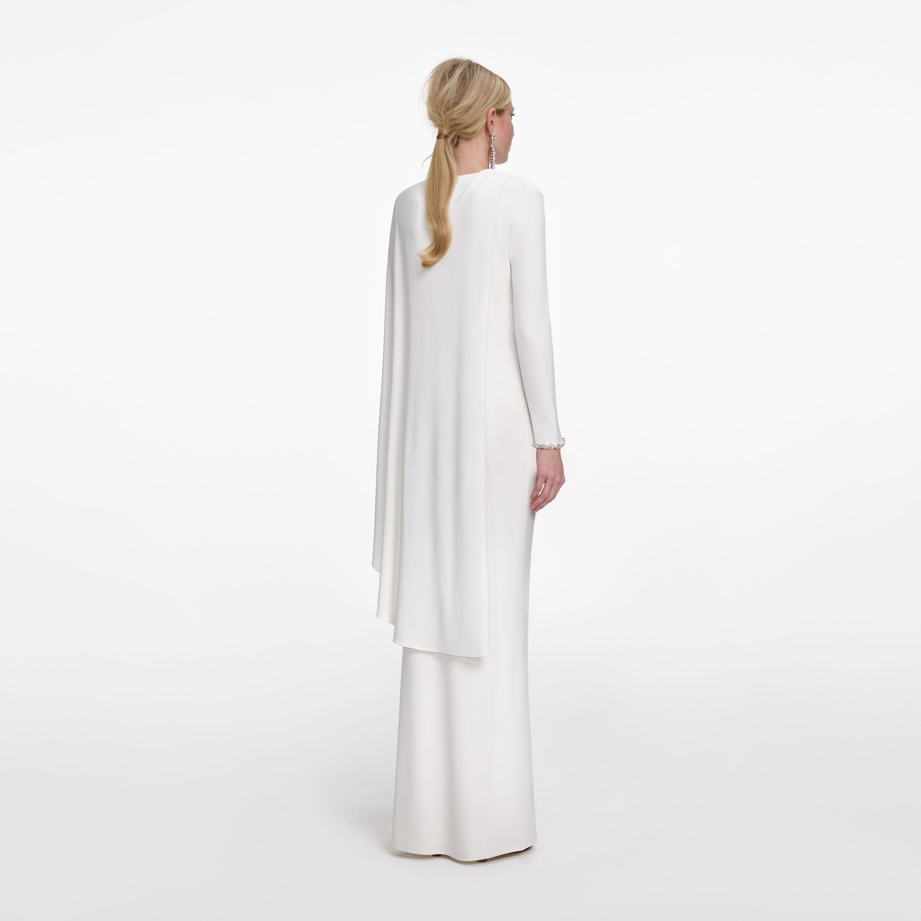 Back view of a woman wearing the White Jersey Drape Maxi Dress