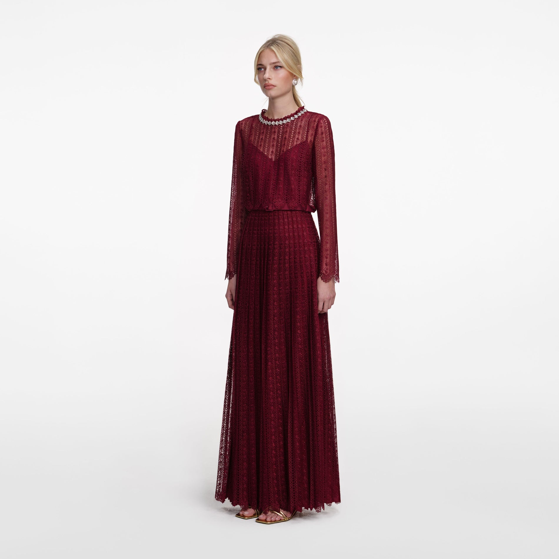 Side view of a woman wearing the Burgundy Organza Lace Maxi Dress