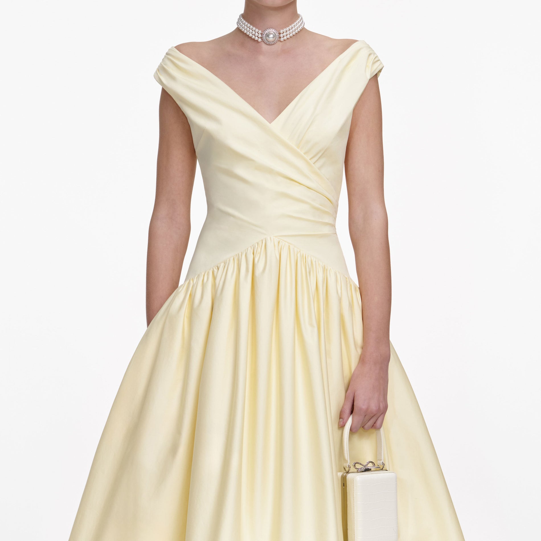 A close up of a woman wearing the Yellow Cotton Midi Dress