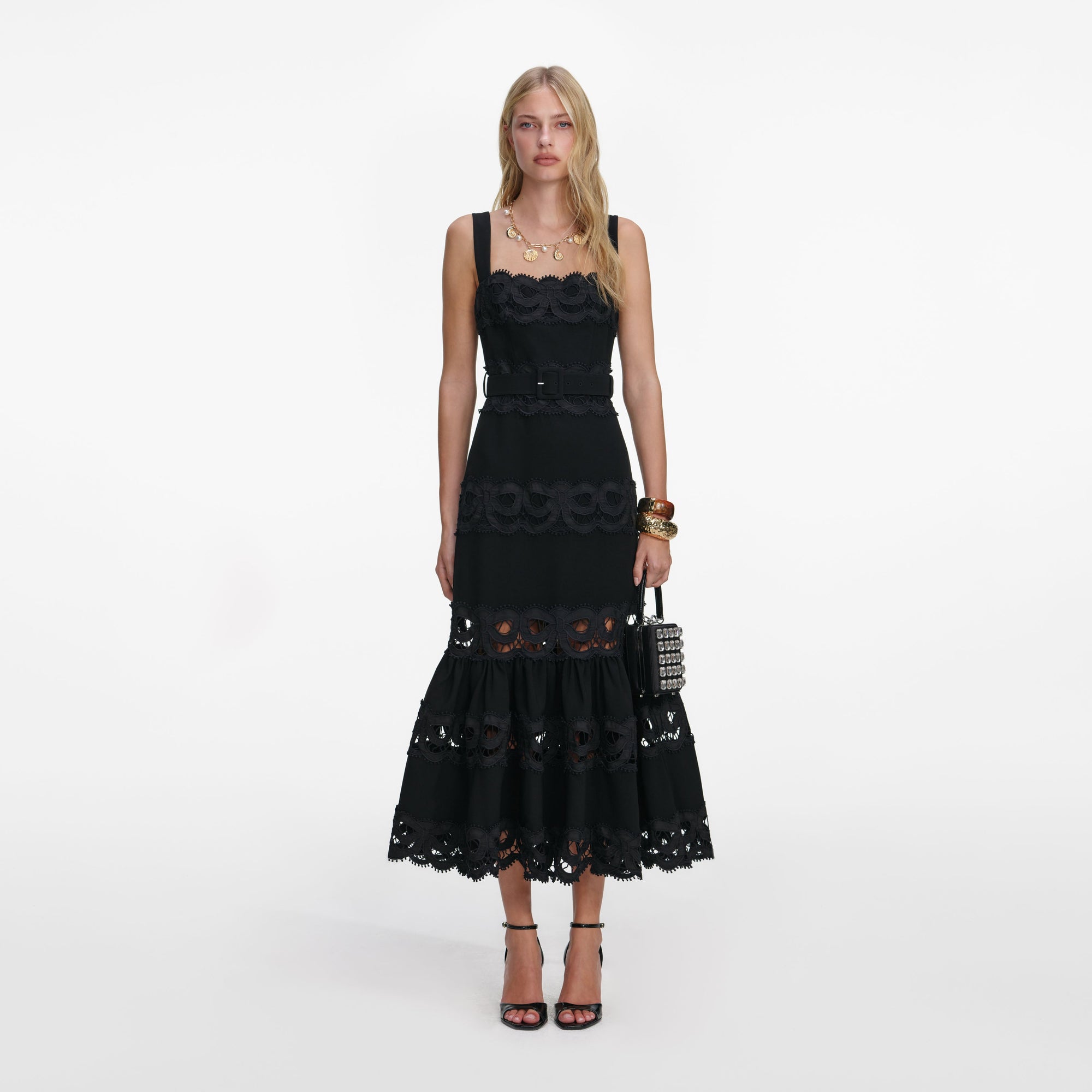 Front view of a woman wearing the Black Crepe Midi Dress