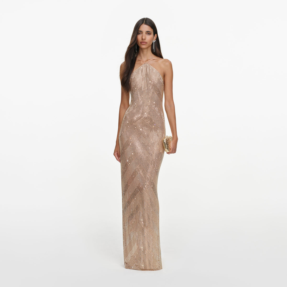 Front view of a woman wearing the Champagne Chevron Rhinestone Halterneck Maxi Dress