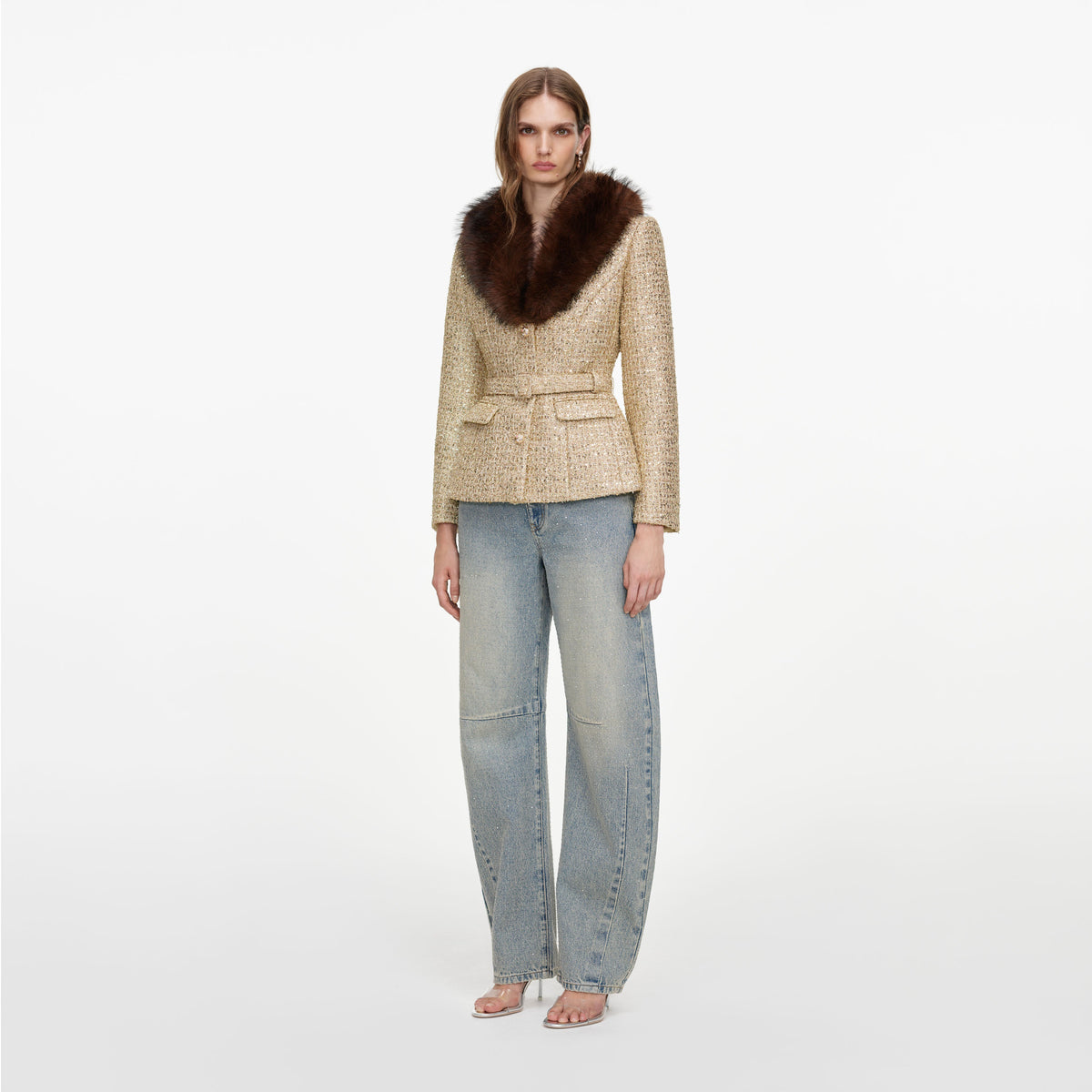 Side view of a woman wearing the Gold Sequin Boucle Fur Collar Jacket