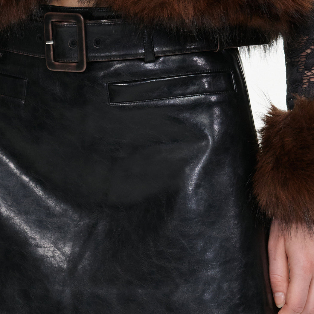 A close up of the fabric for the Black Faux Leather Mini Skirt