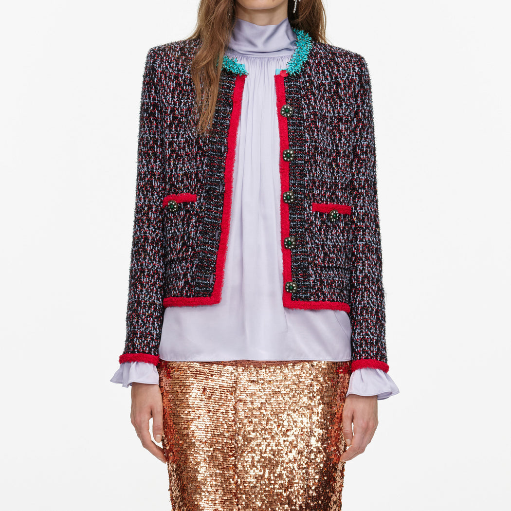 A close up of a woman wearing the Multi Textured Knit Cardigan