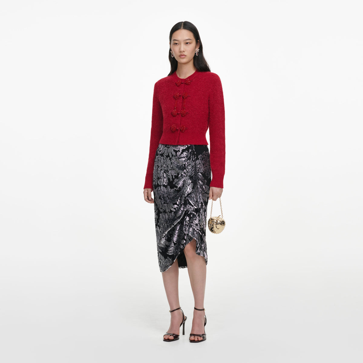 Side view of a woman wearing the Red Soft Knit Cardigan