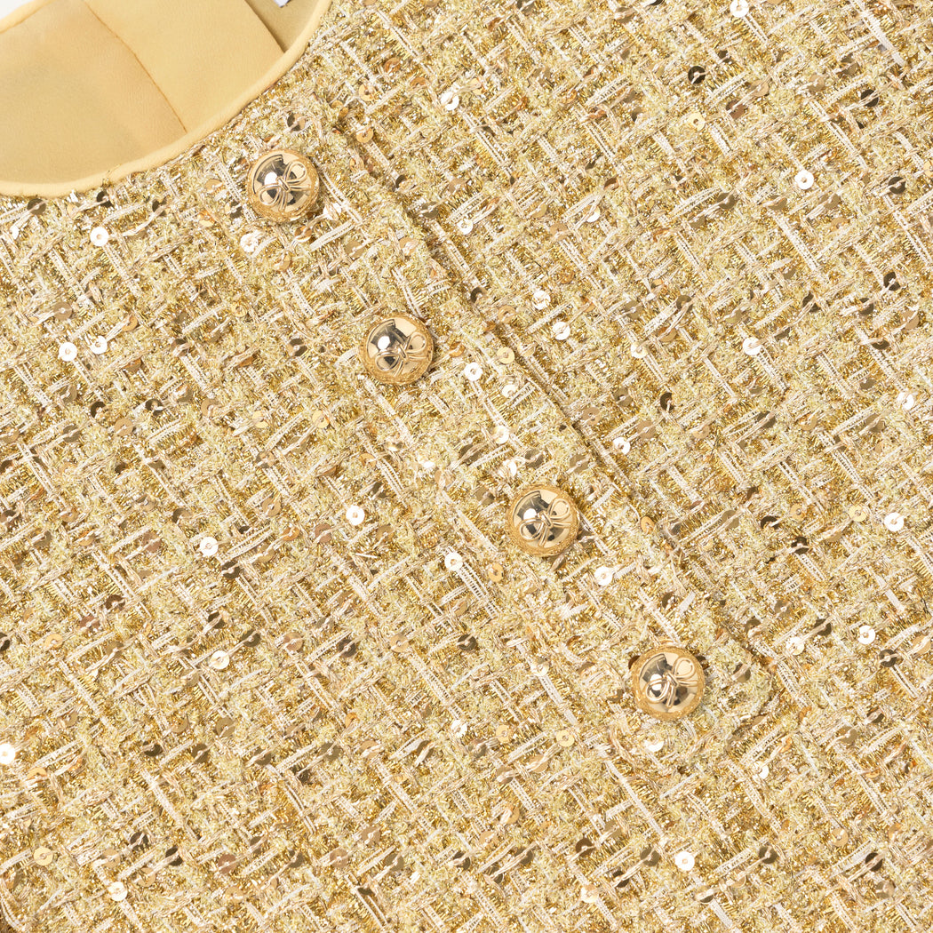 Detail Shot of the Gold Boucle Dress