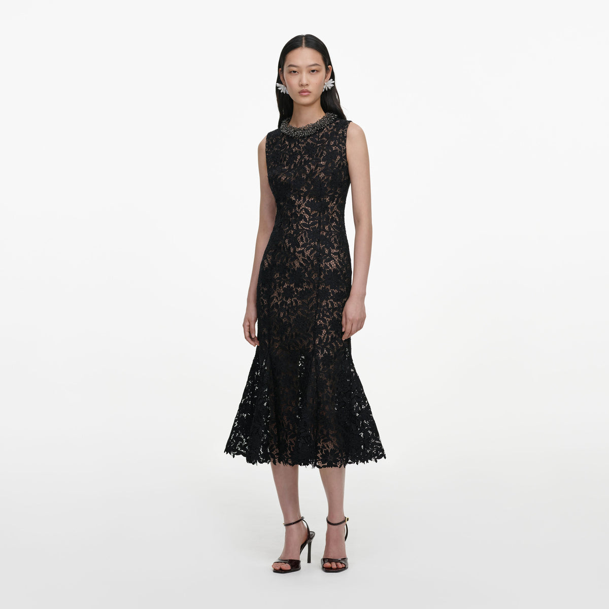 Side view of a woman wearing the Black Lace Beaded Trim Midi Dress